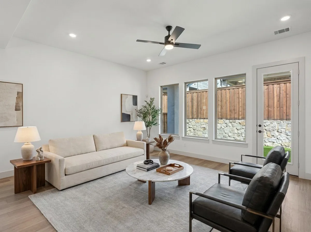 Recessed lighting, ceiling fan, wood-finish flooring, multiple windows, and a glass-paneled door