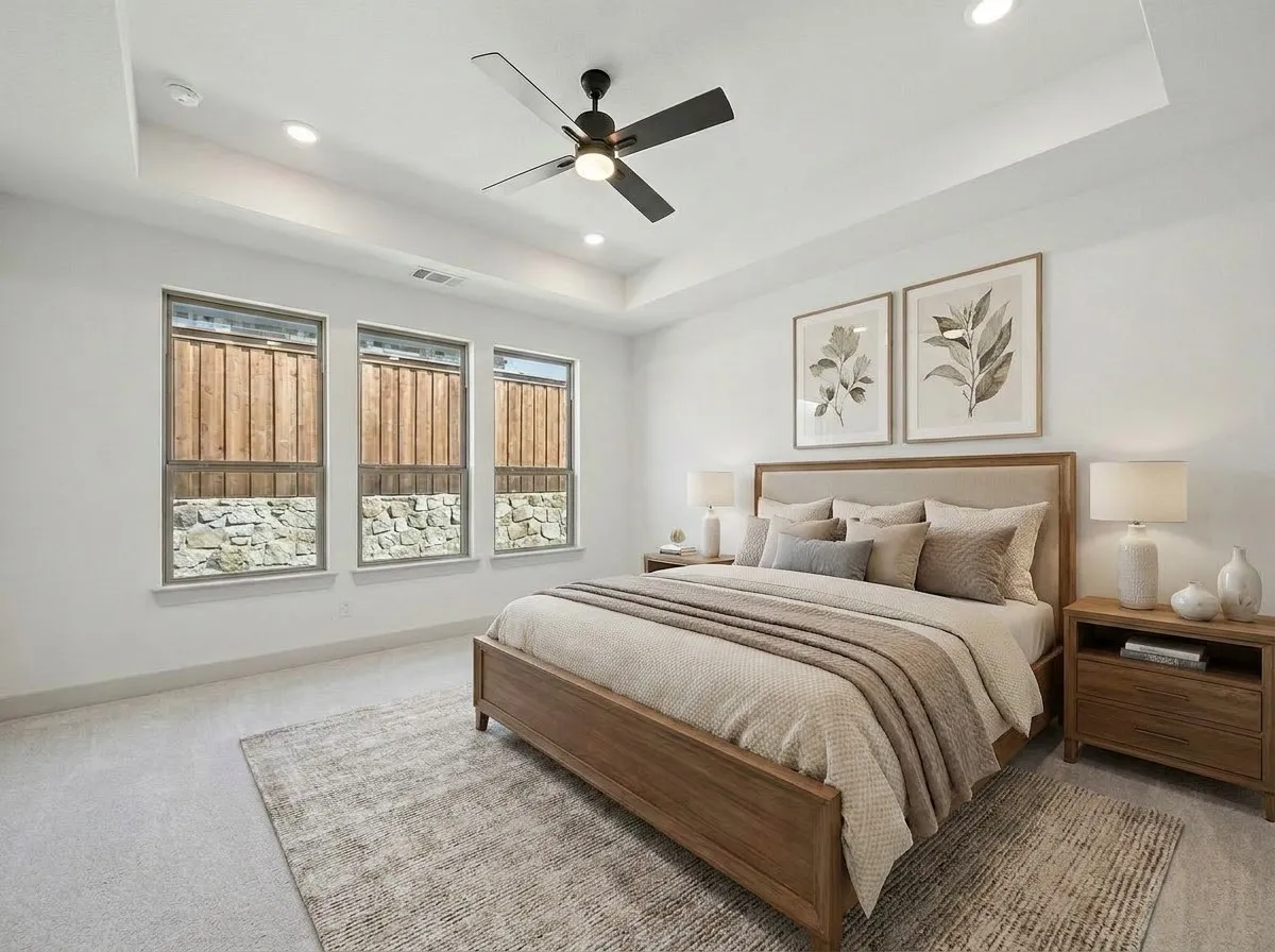 Tray ceiling with recessed lighting and a ceiling fan