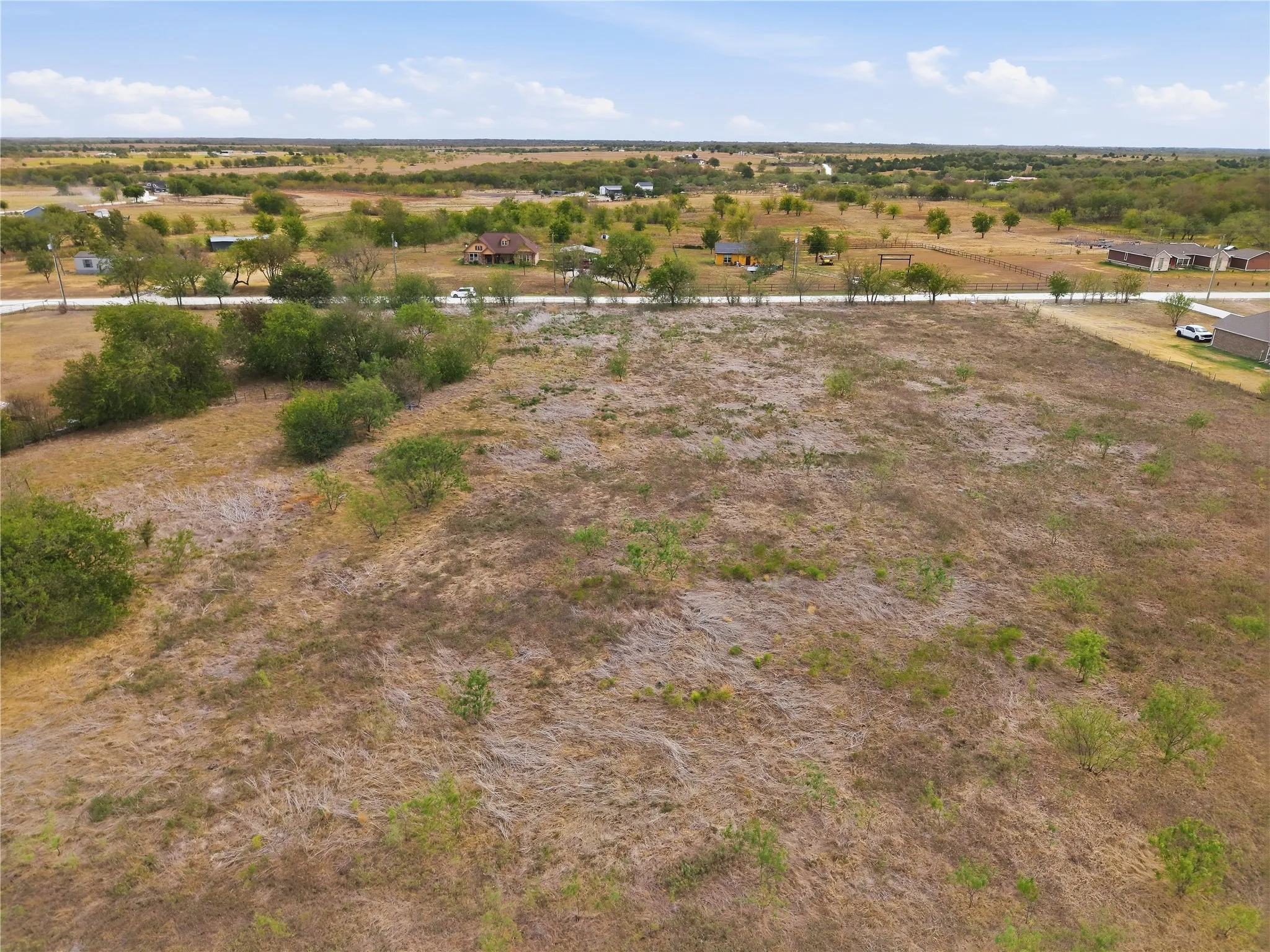 Expansive undeveloped lot with natural vegetation