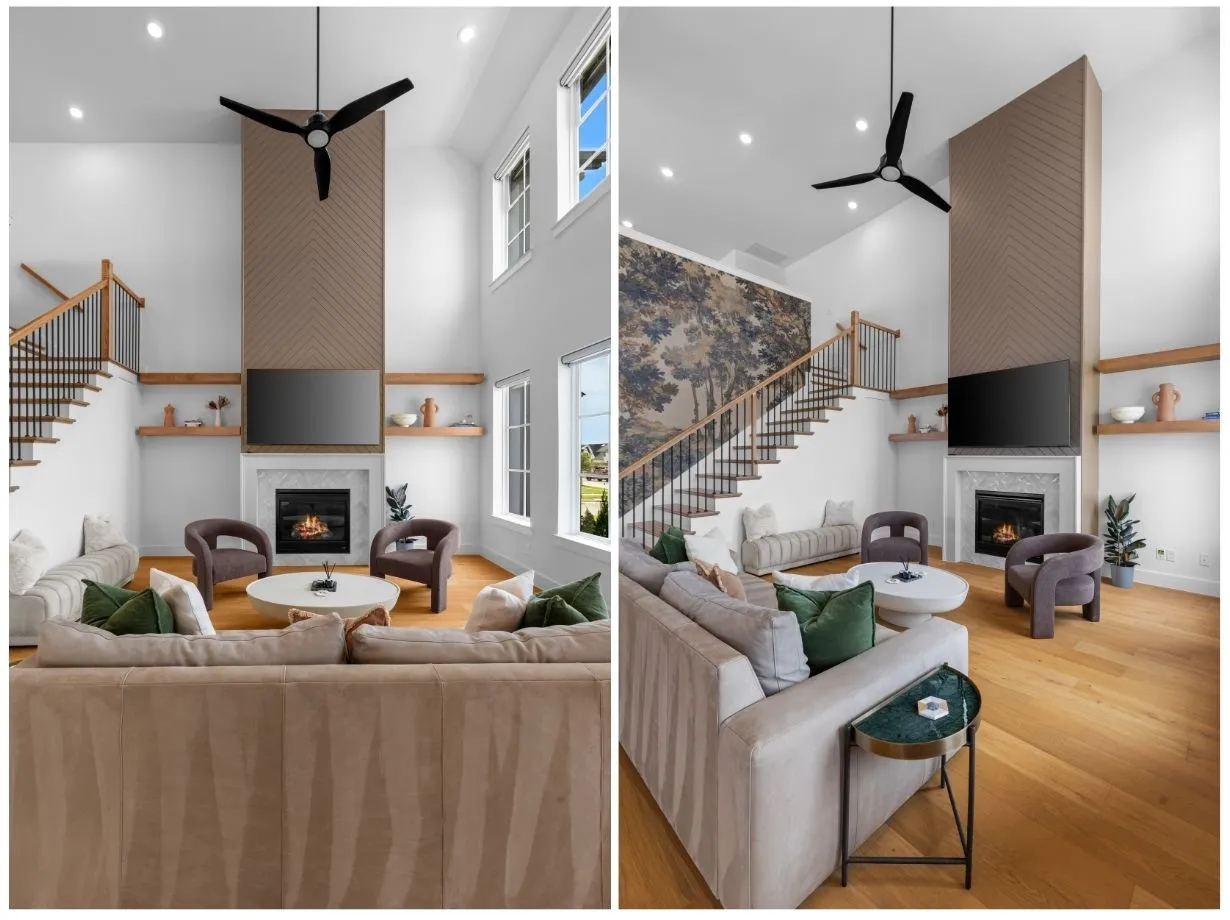 Two-story living area featuring a fireplace with a stone surround, wood-finish flooring, a wood-accented wall, and a staircase with a wood handrail and black balusters