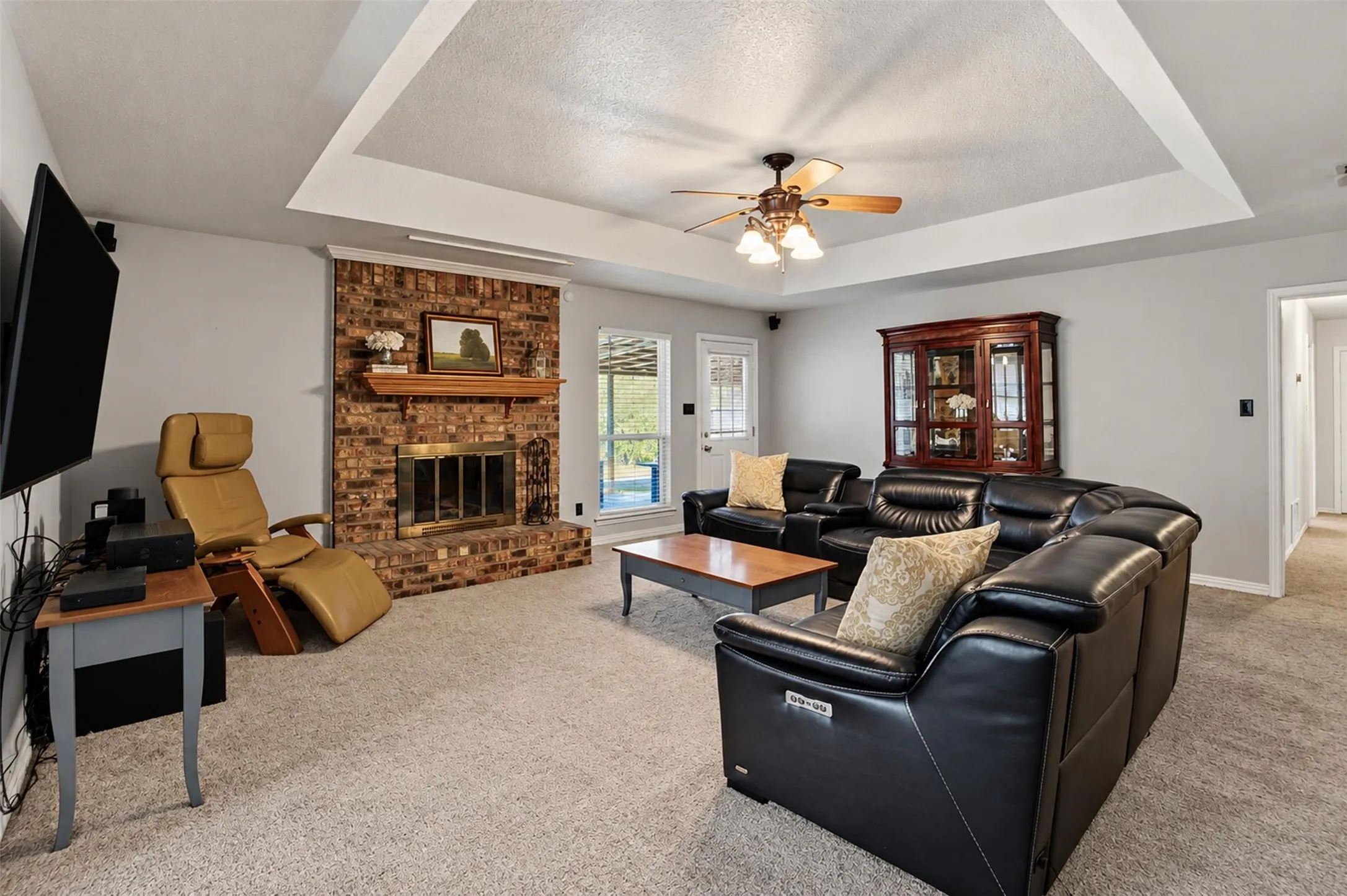 Vaulted ceilings add character and an airy feel to this comfortable gathering space.