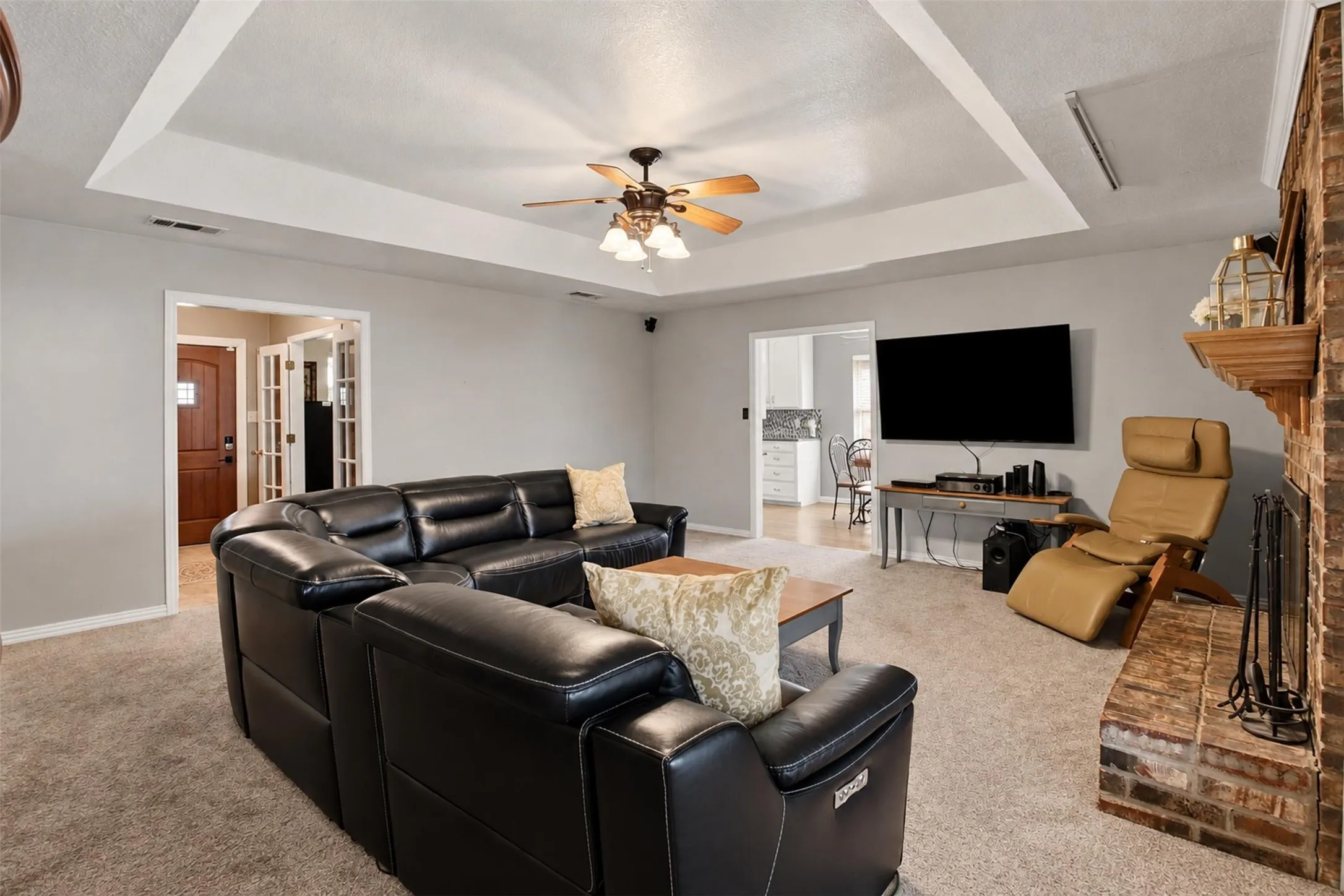 Another perspective of the living room, offering plenty of possibilities for furniture arrangements.