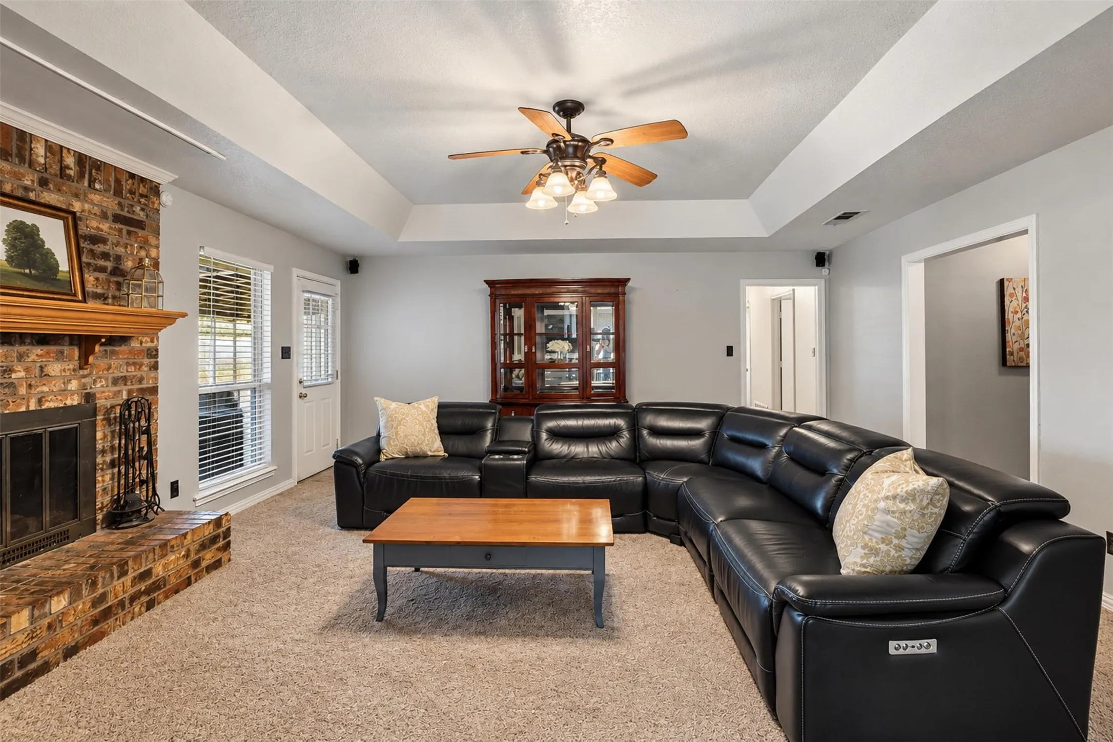 A welcoming living room with a fireplace and plenty of room to unwind.