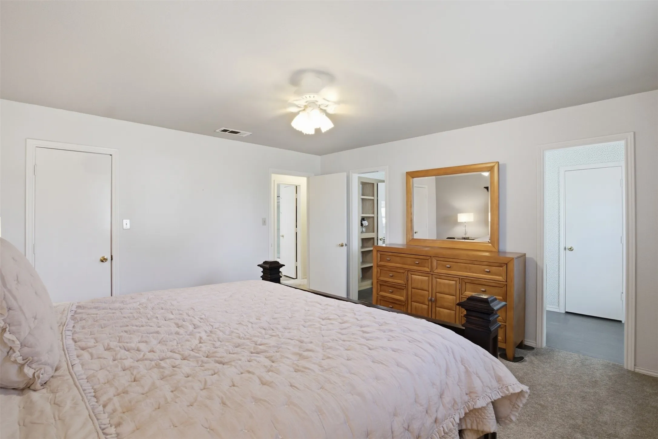 A peaceful primary retreat with a thoughtful layout and room to make it your own.