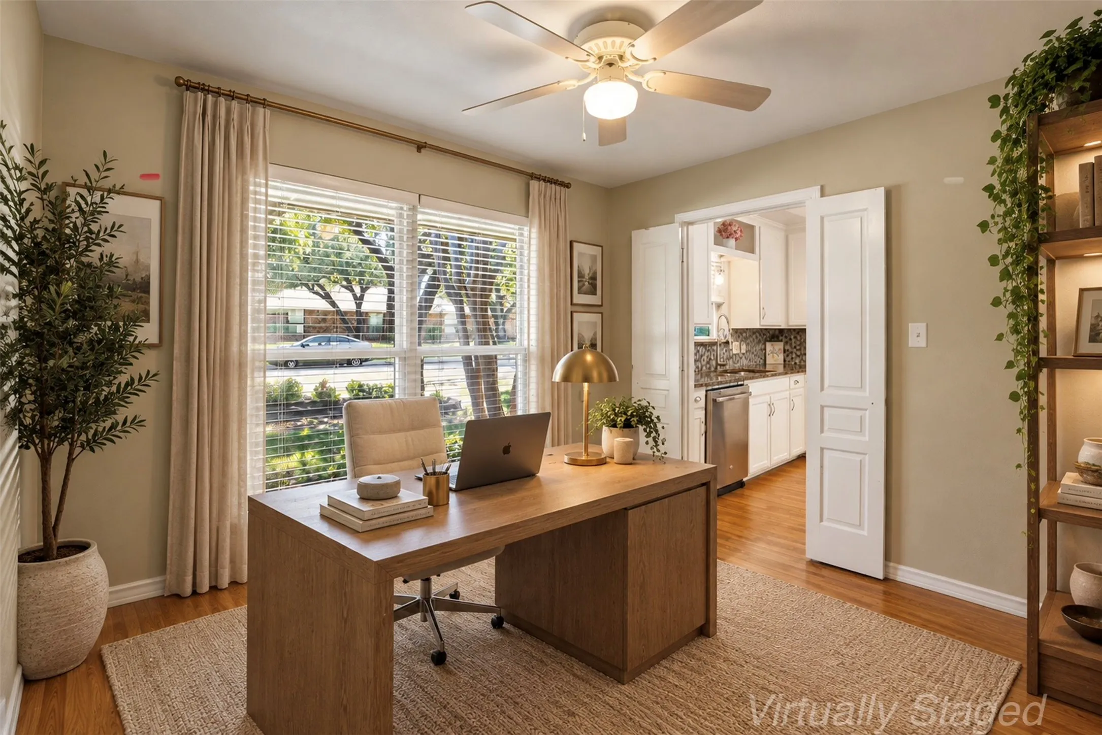 Virtually staged to showcase the possibilities of a stylish and functional home office.