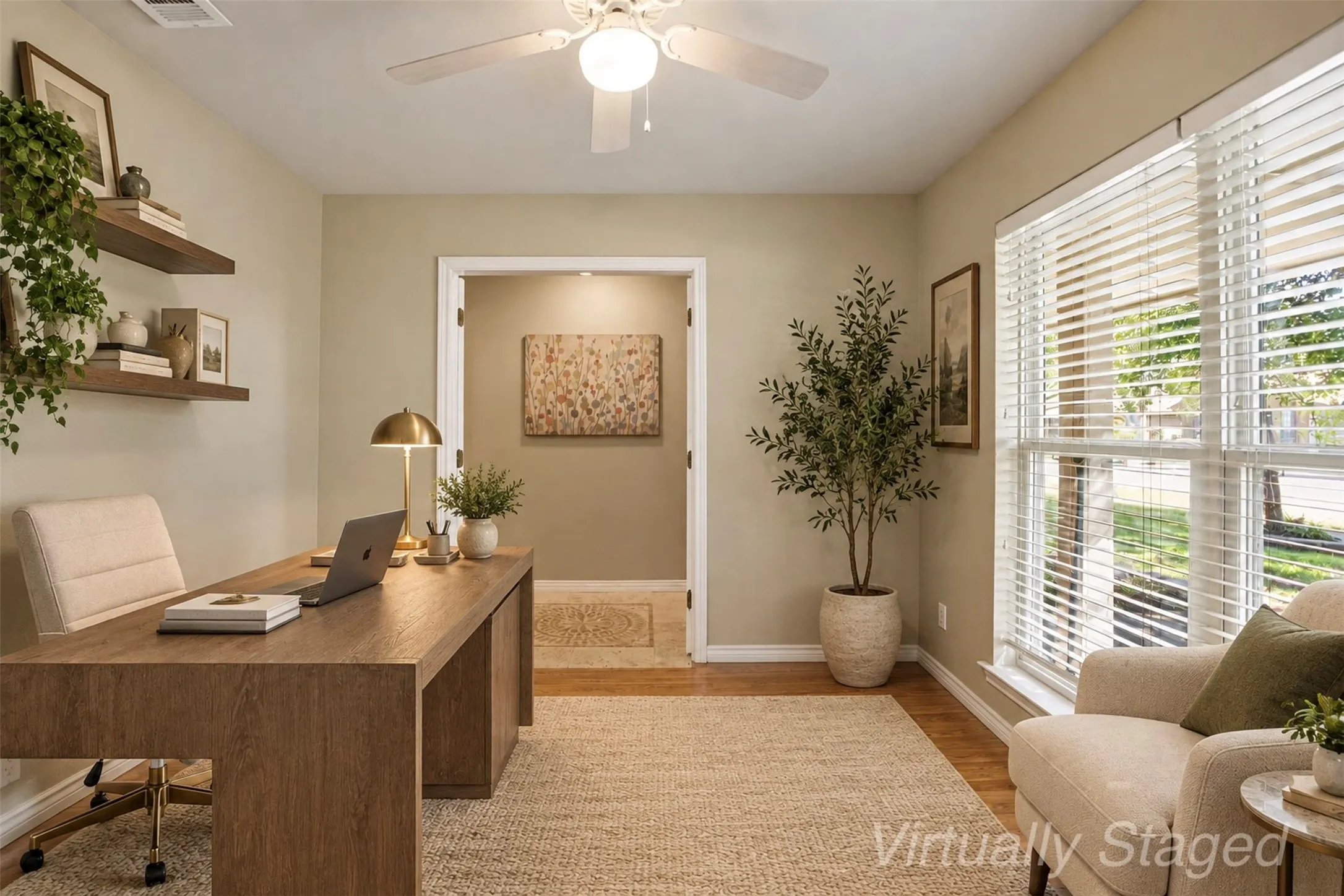 A second virtually staged perspective showing how easily this space can become an inspiring home office.