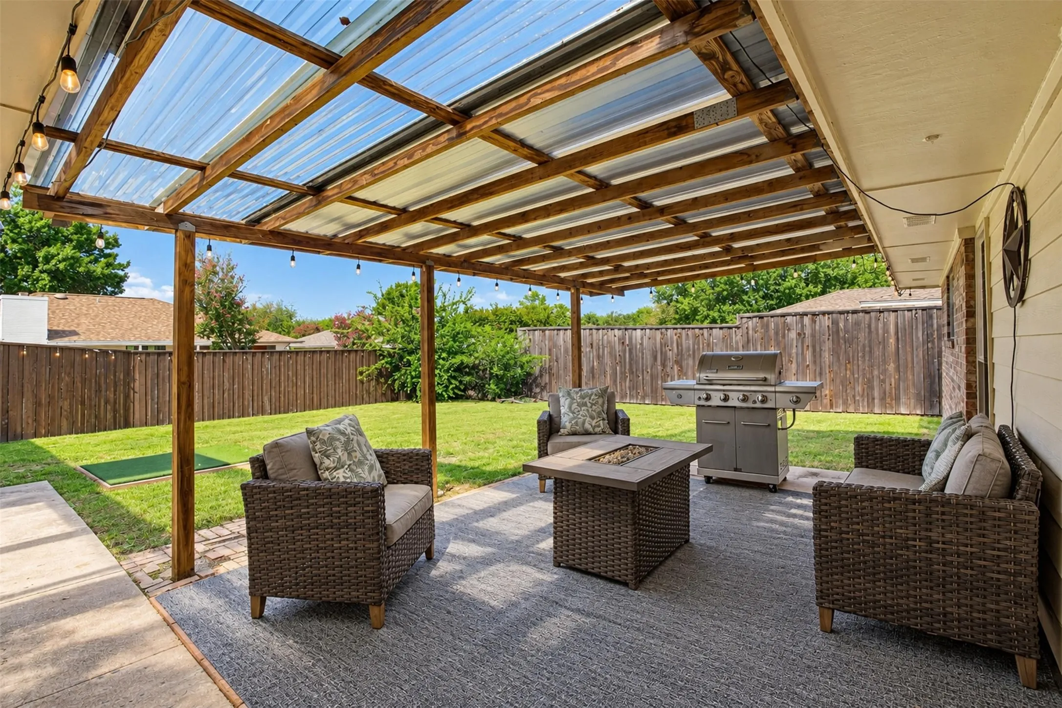 Your own covered outdoor retreat! A pergola-style patio offers a lovely spot to relax or entertain.