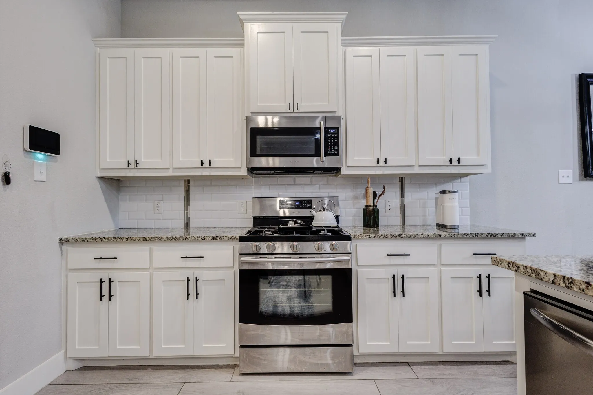 Stainless steel range, microwave, and dishwasher