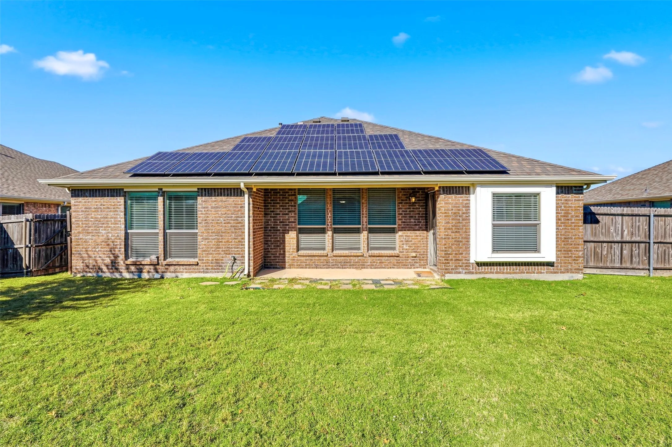 Brick exterior with multiple solar panels