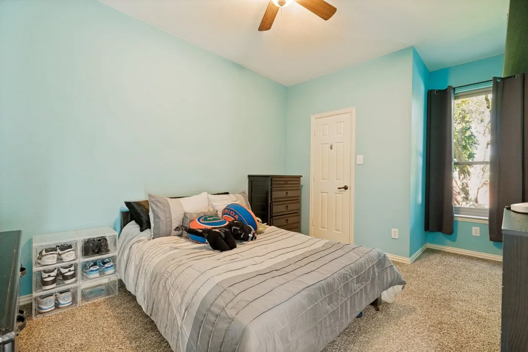 Convenient full bathroom located on the main level, serving guests and the downstairs bedroom.