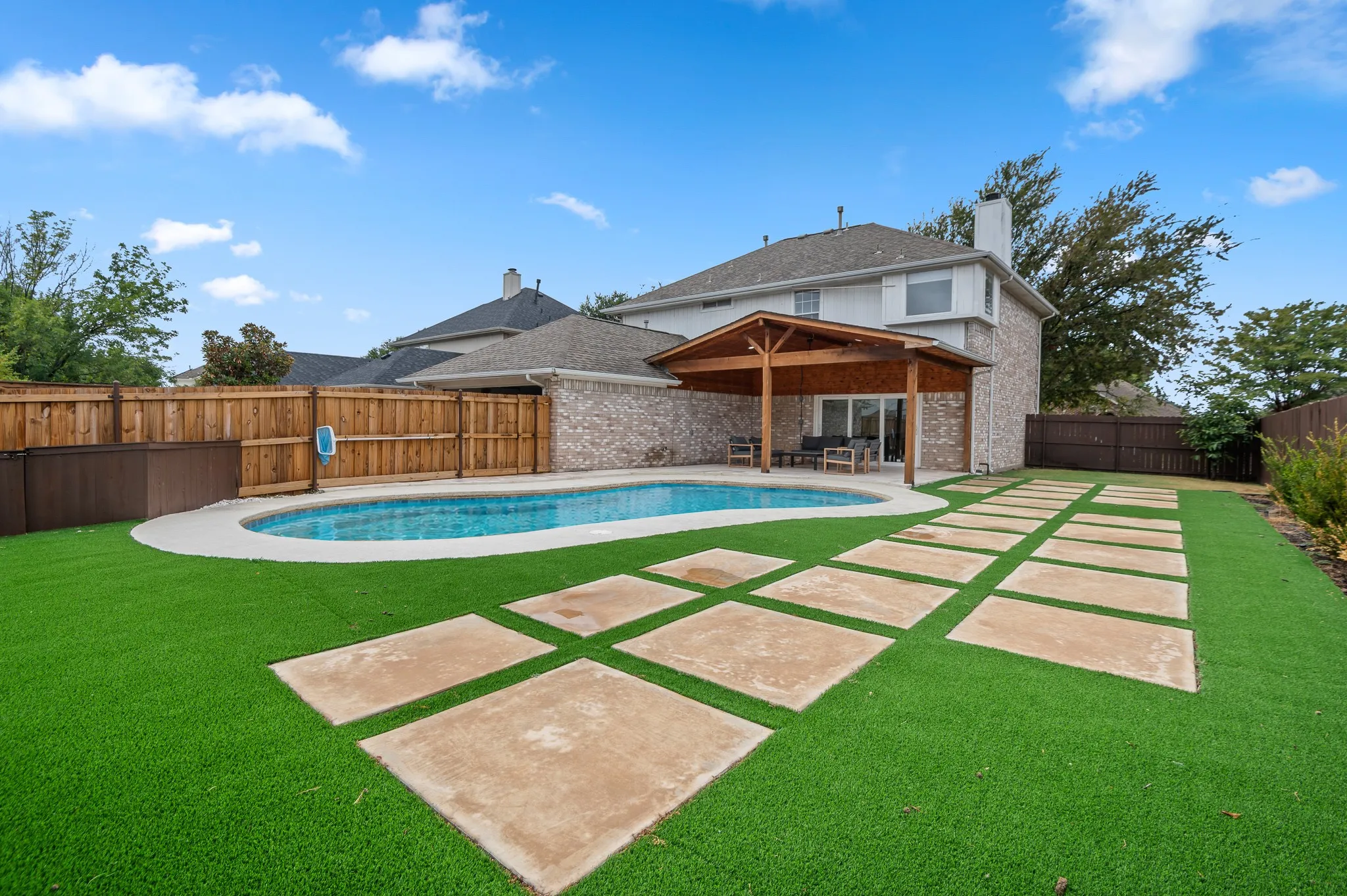 Photo edited to add water to pool. Not currently filled.
