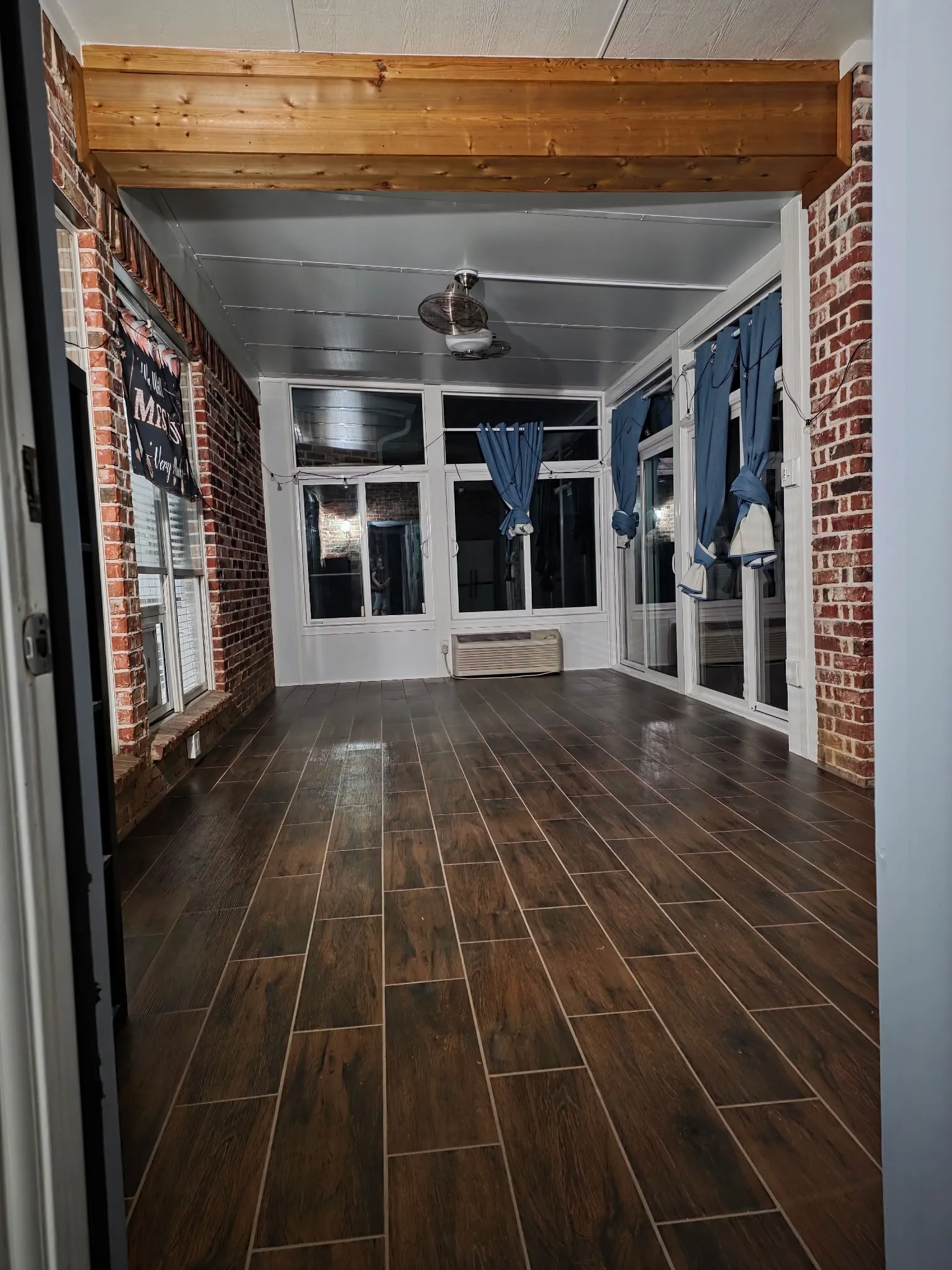 New enclosed patio flooring - wood like tile