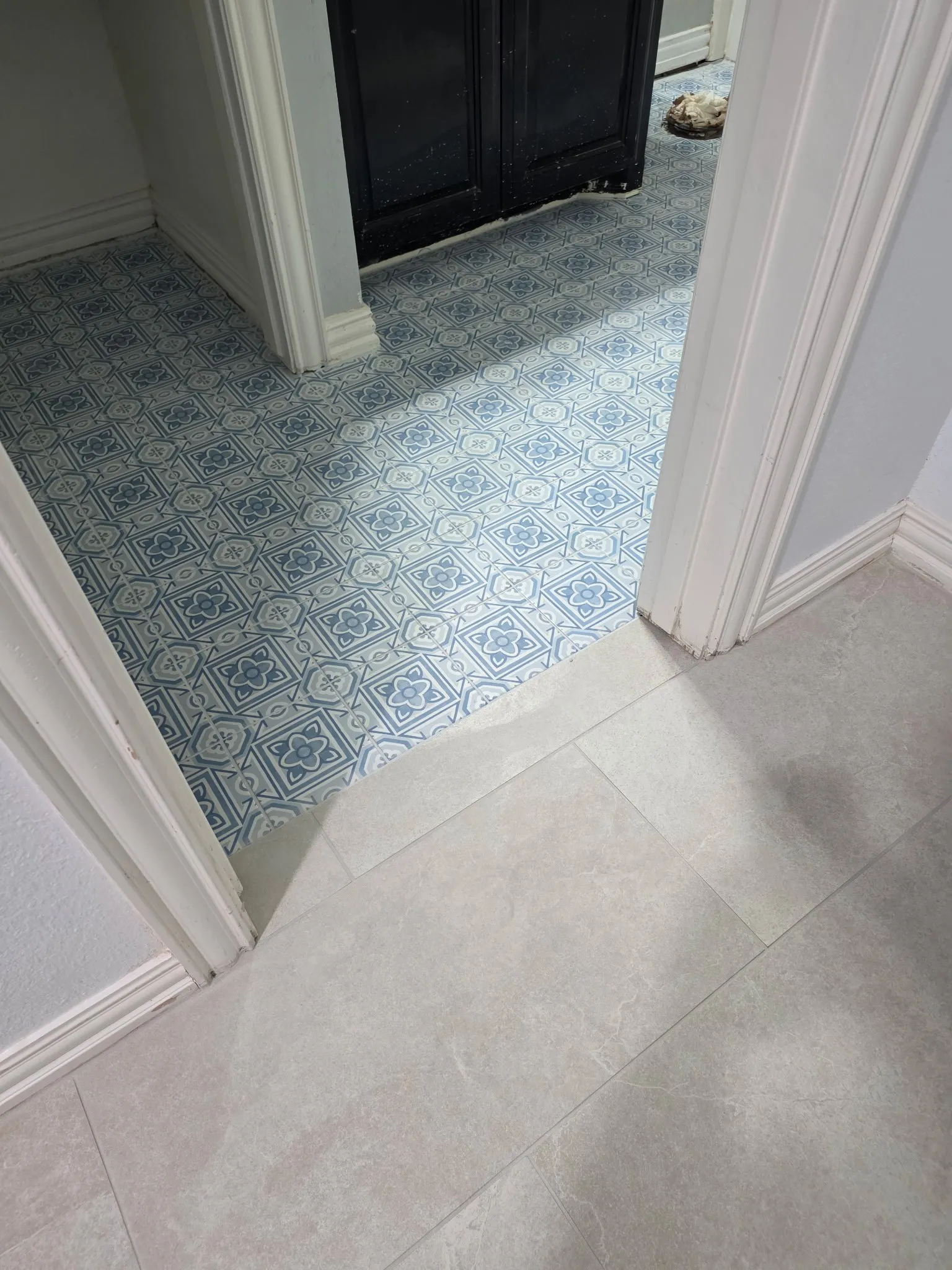 New floor in rear bath near laundry room