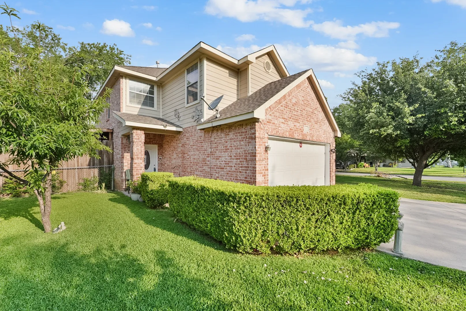 Brick and siding exterior with a gabled roof