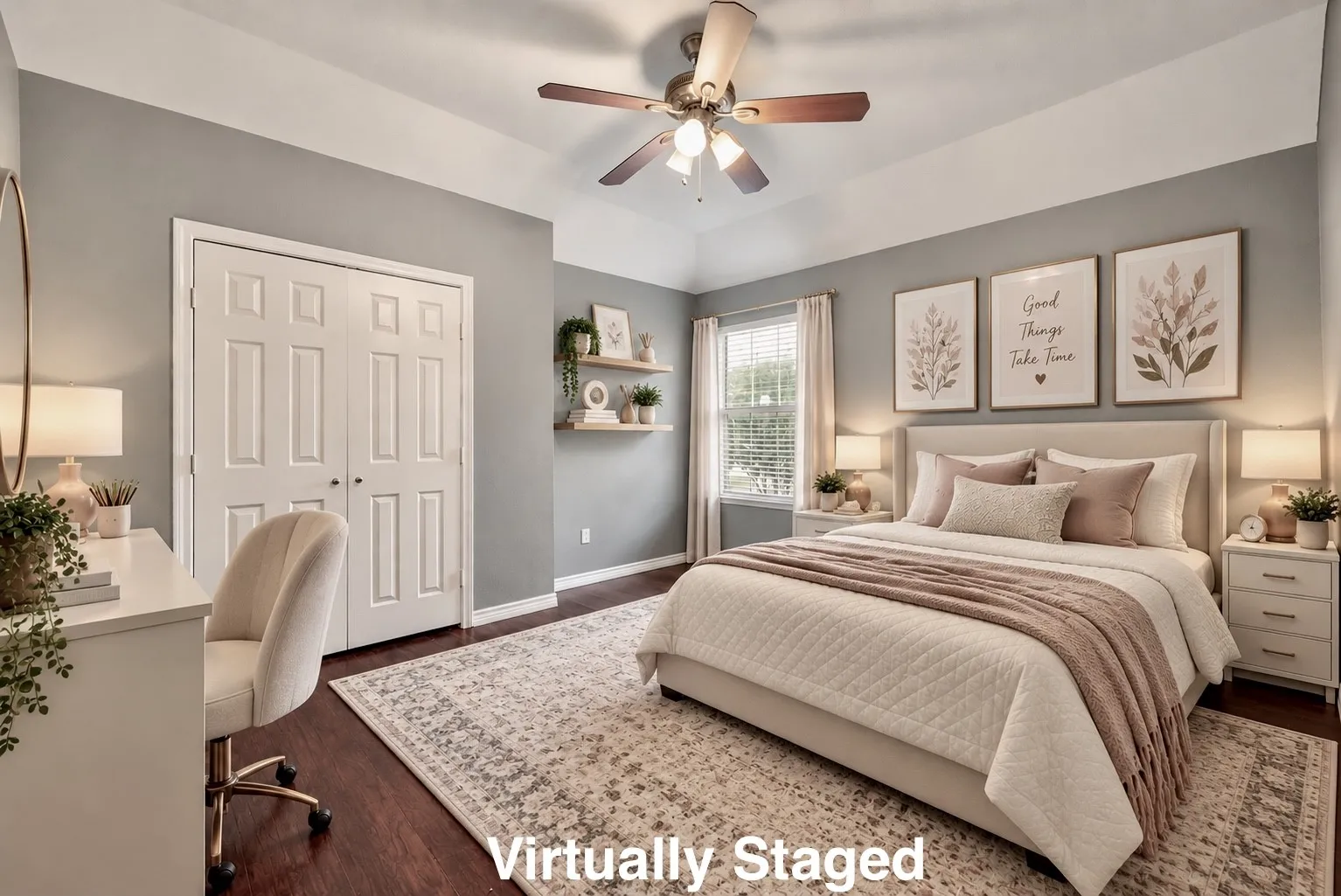 Tray ceiling with a ceiling fan, wood-finish flooring, built-in shelving, and a double-door closet
