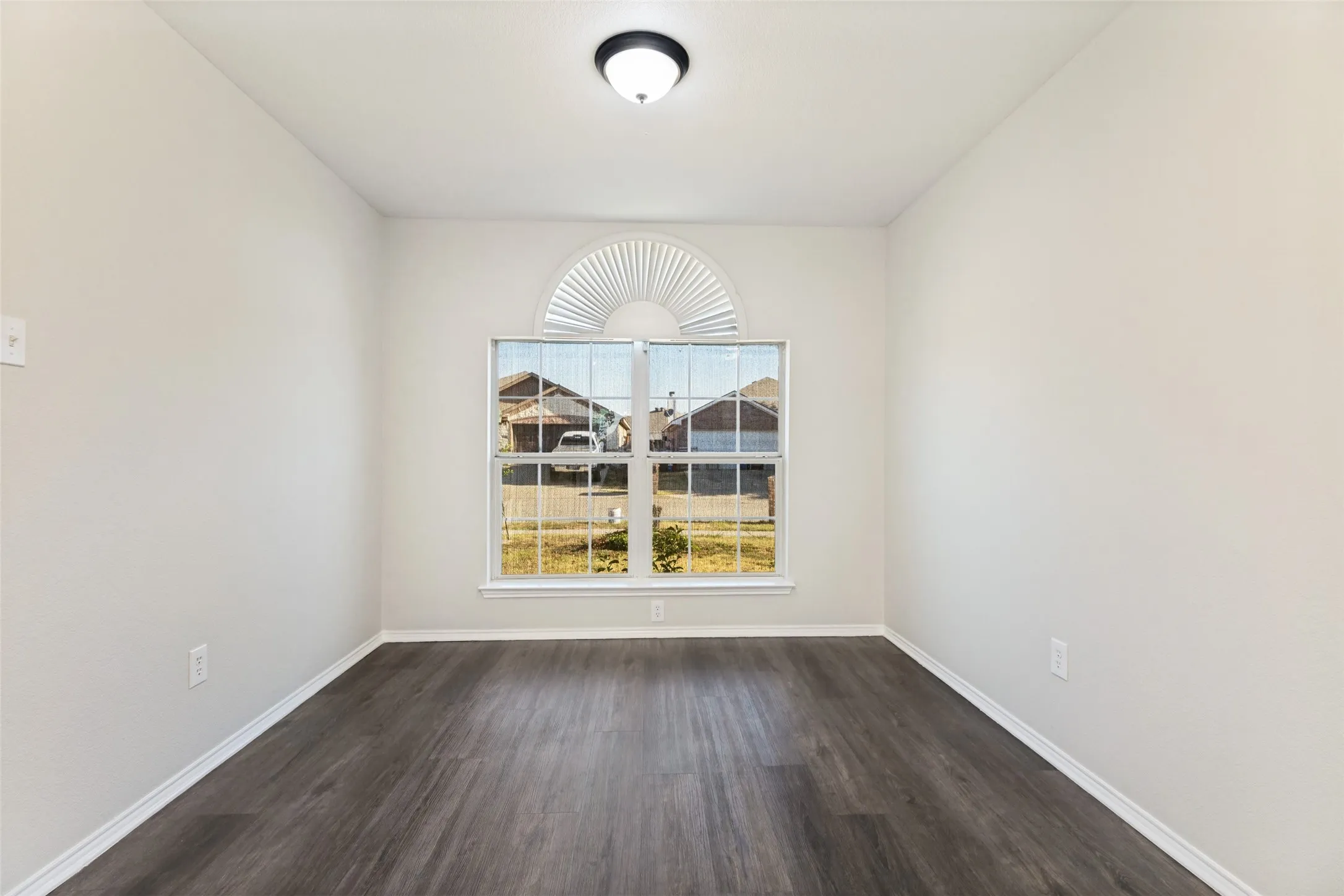 Wood-finish flooring with white trim