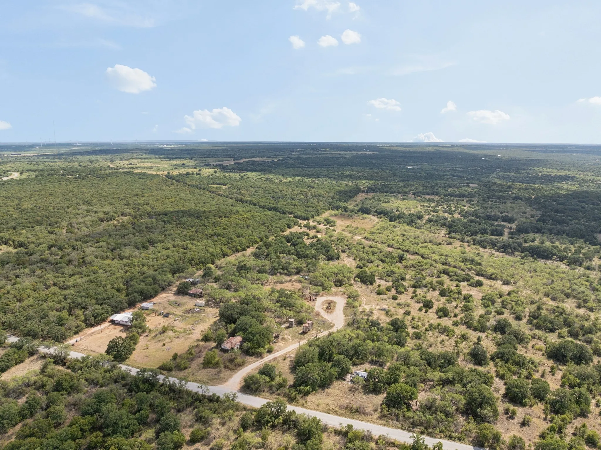 Expansive natural landscape with varied tree coverage
