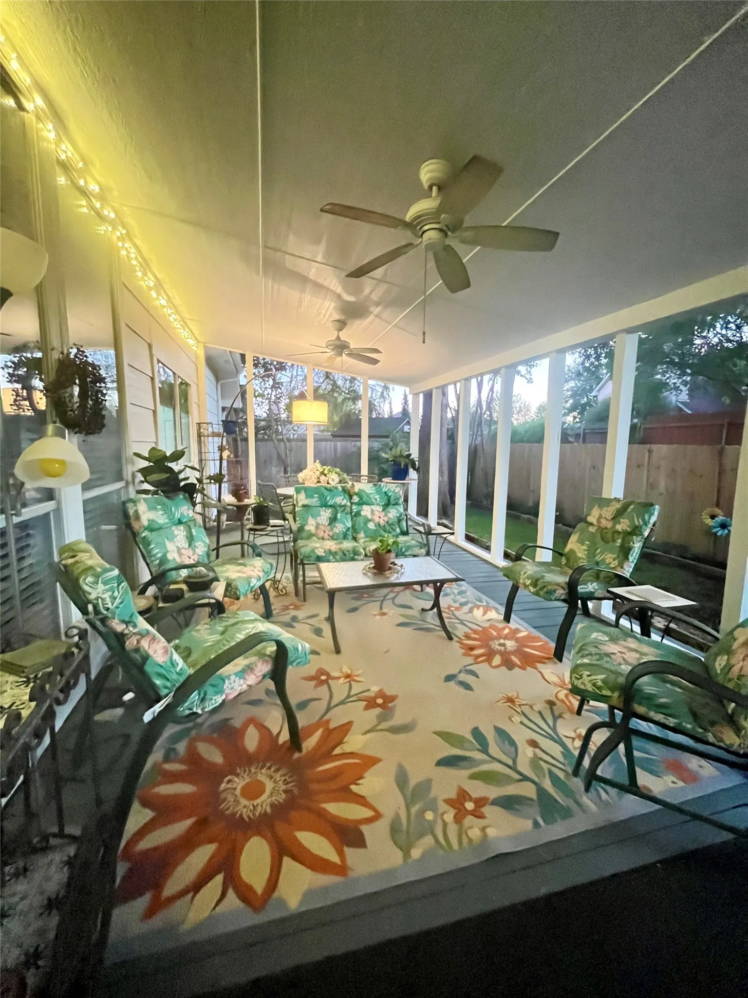 southern living style old fashion covered porch. the perfect place to relax and make lots of memories. dusk