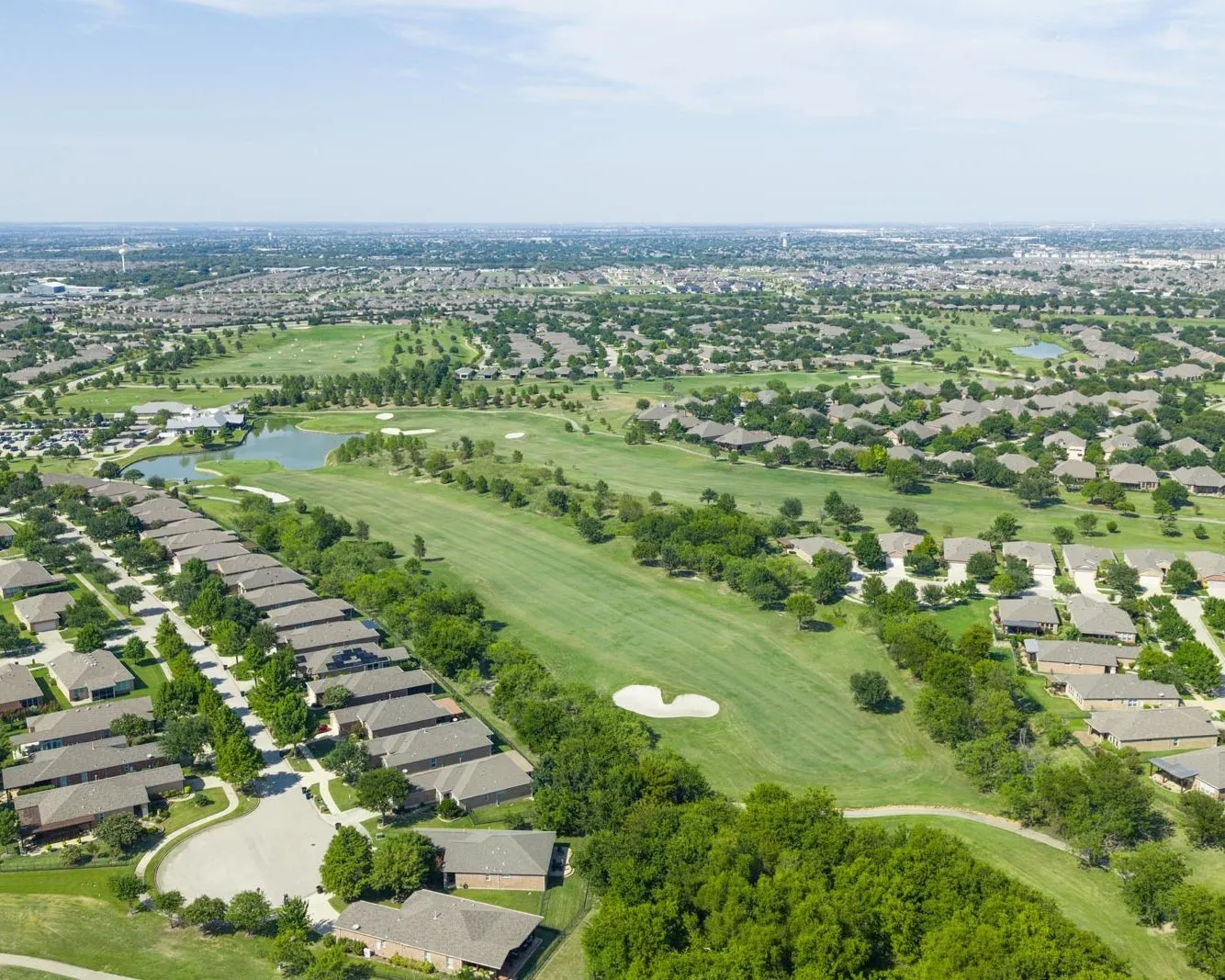 View of homes and golf course