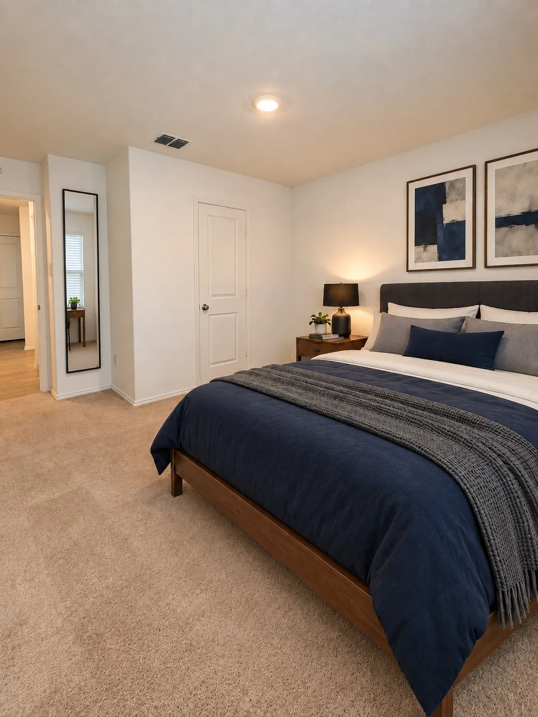 *Virtually Staged* Well-sized secondary bedroom featuring neutral carpeting, recessed lighting, a large window for natural light, and a closet for storage.