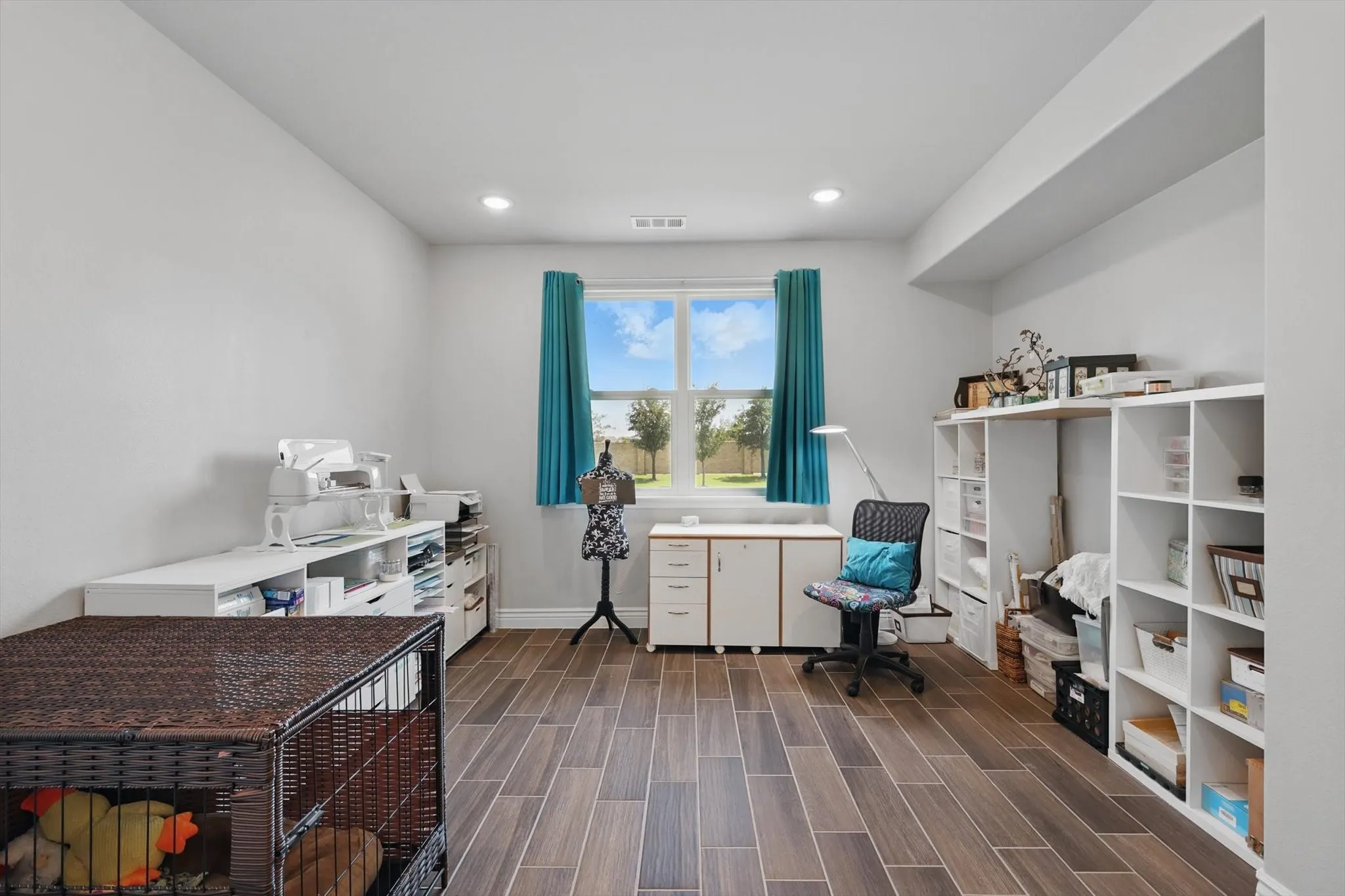 Office area featuring plenty of natural light.