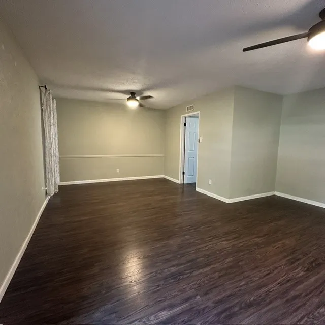 Front Living and Dining area with multiple fans
