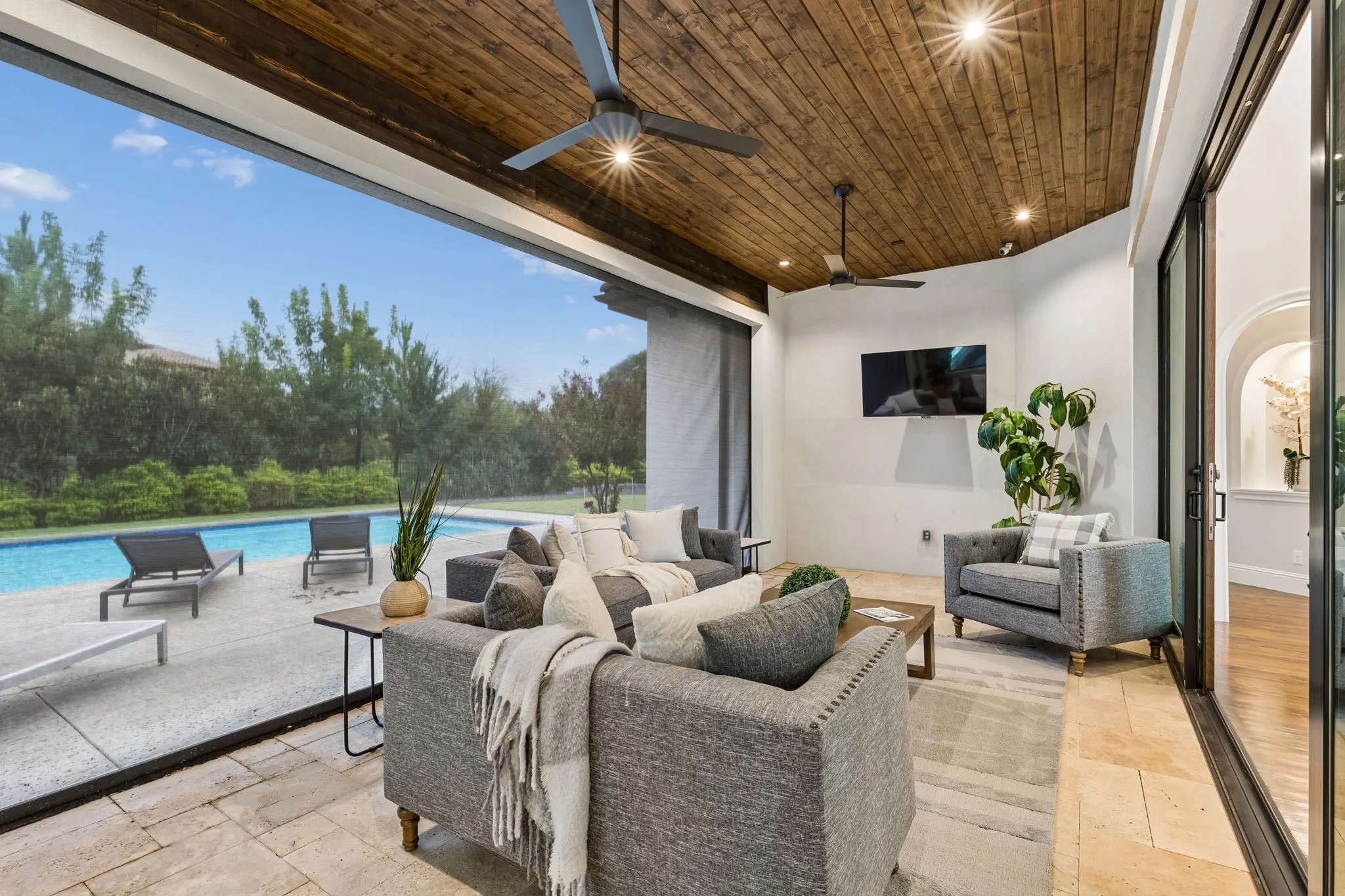 This patio with drop down screens extends the living area to the outdoors!