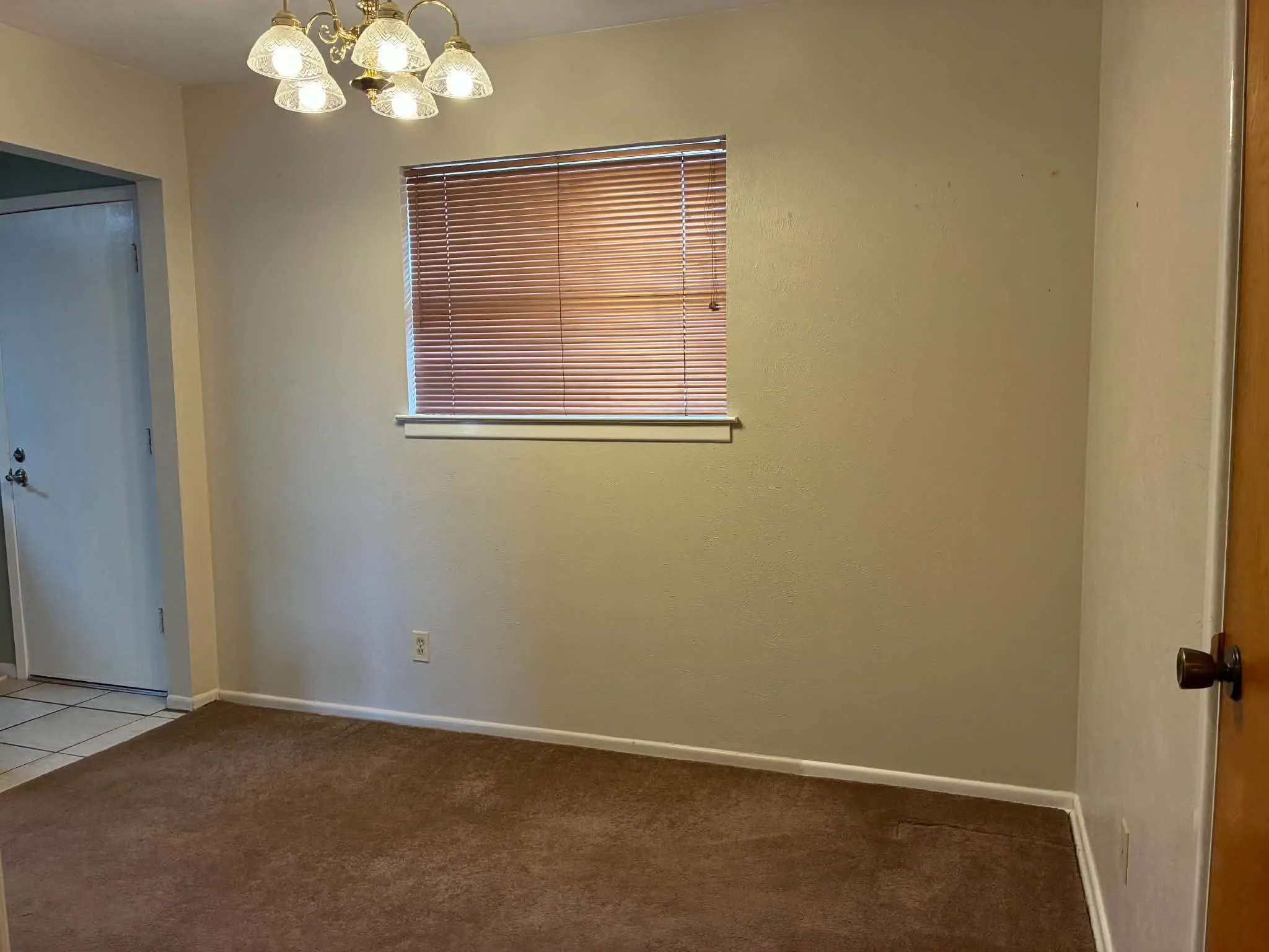 3rd bedroom with closet being used at dining area