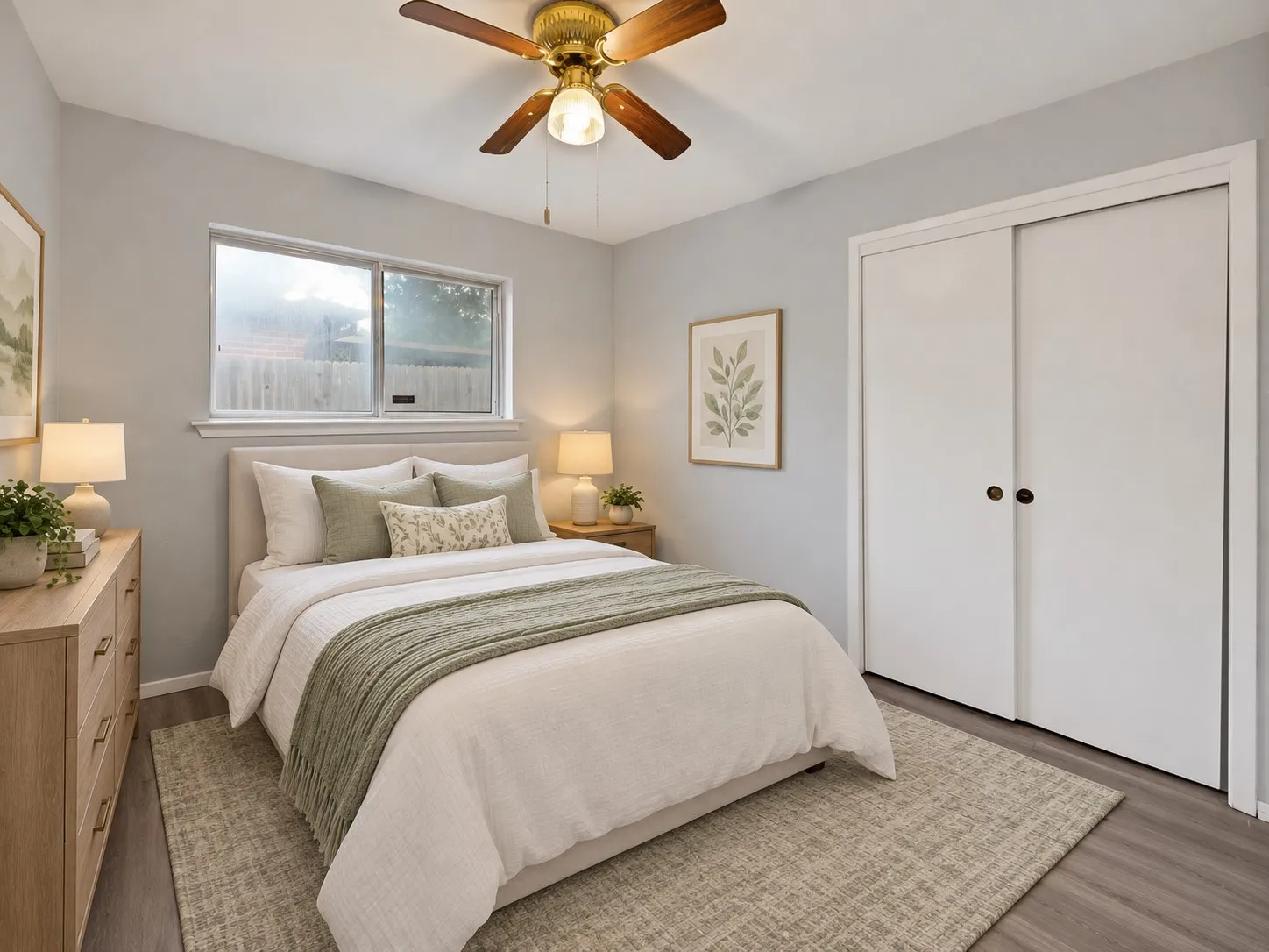 Bedroom: Bedroom with sliding door closet, ceiling fan, and window. Virtually staged.