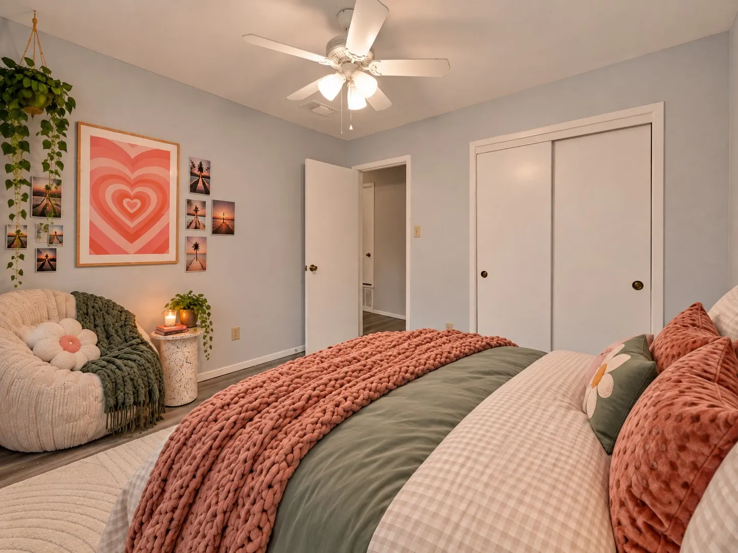Secondary bedroom: Sliding door closet and ceiling fan. Virtually staged.