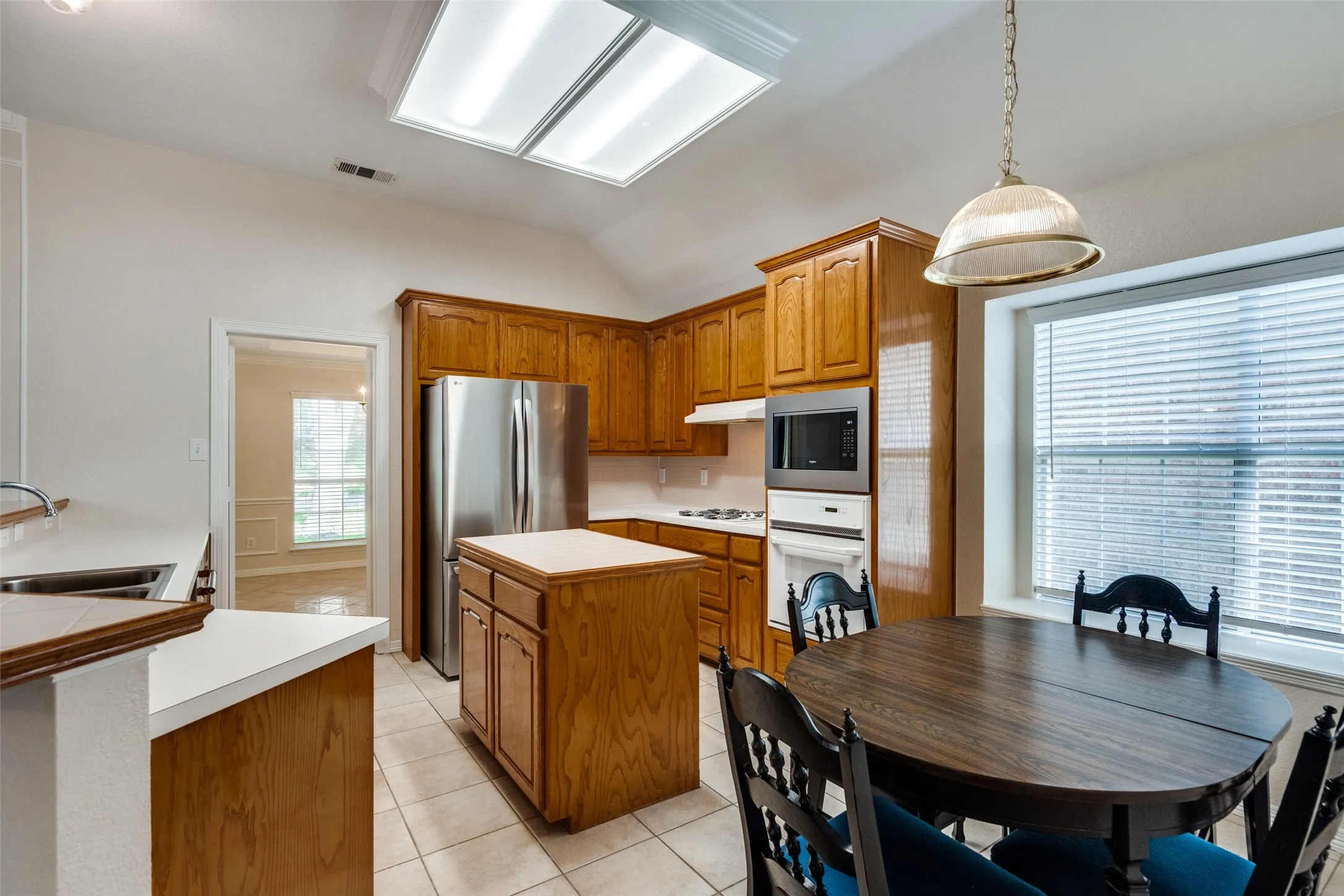 Kitchen with island and breakfast area