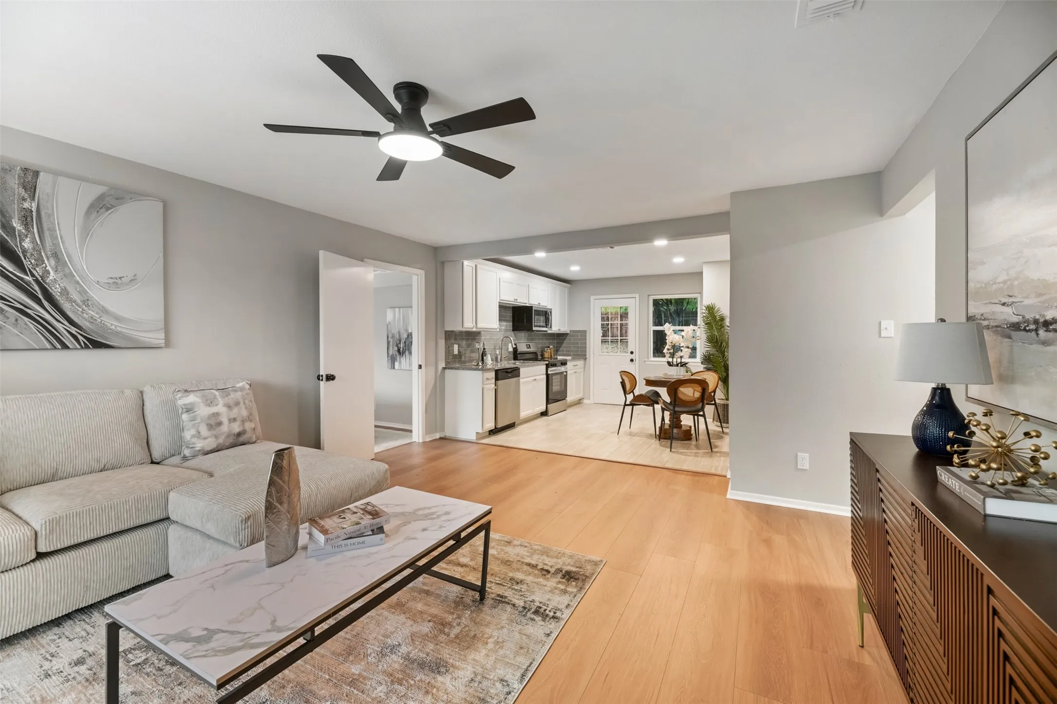 The living room flows nicely into the kitchen.