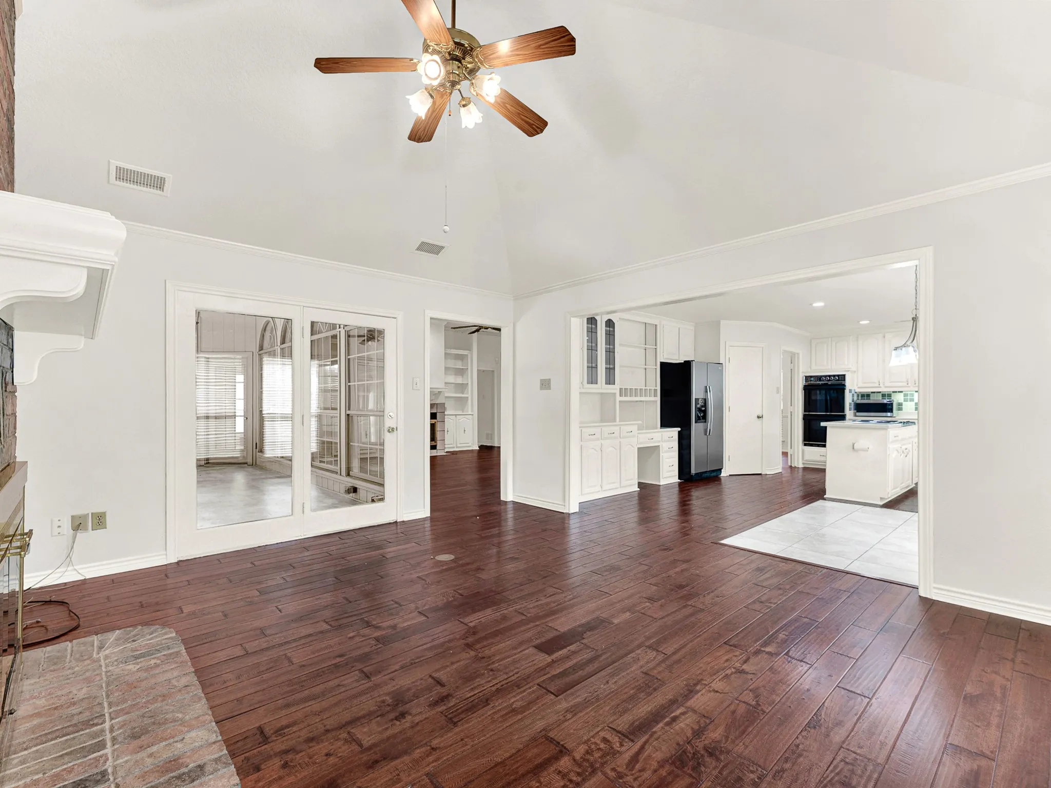 This living area is open to the kitchen and breakfast areas; greaat for entertaining