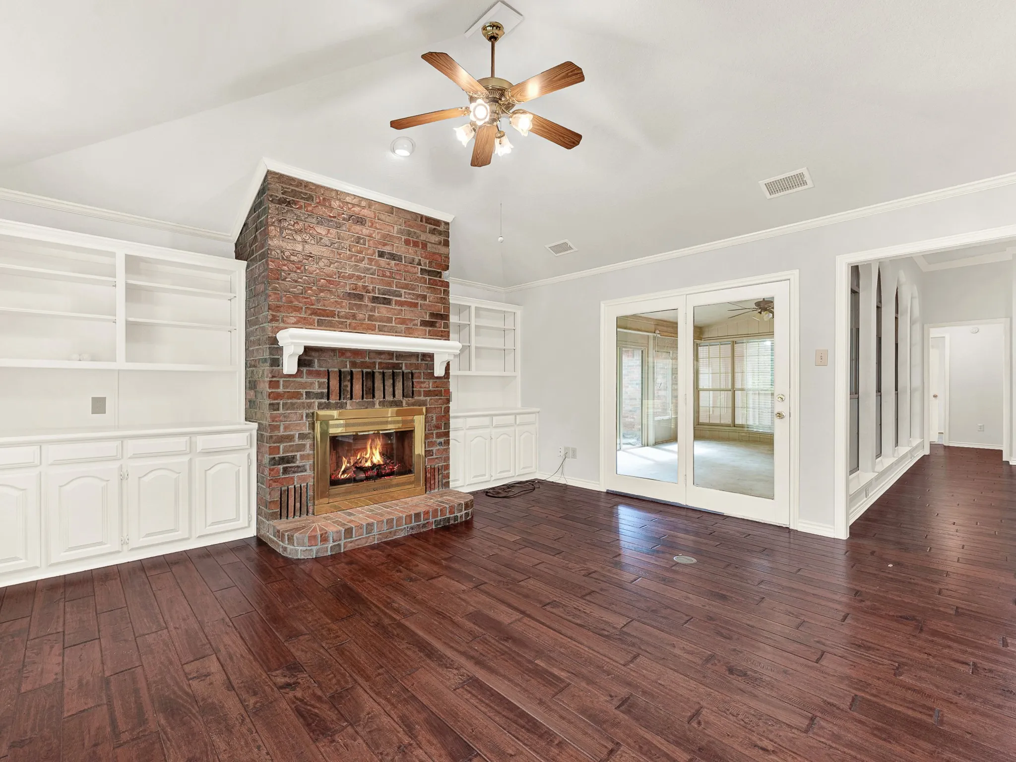 Formal living room features a second fireplace