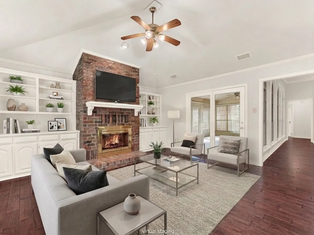 Formal living room features a second fireplace
