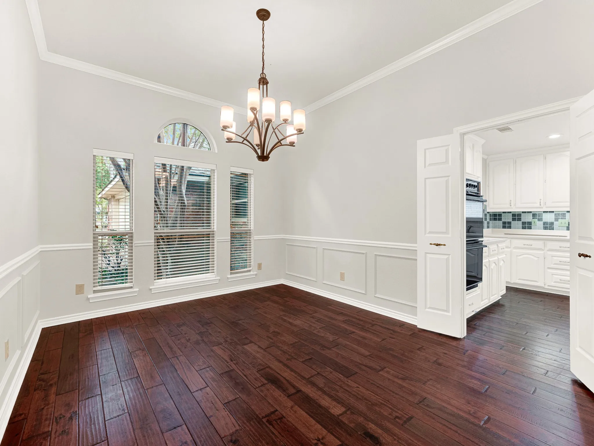 Dedicated formal dining room with easy access to the kitchen