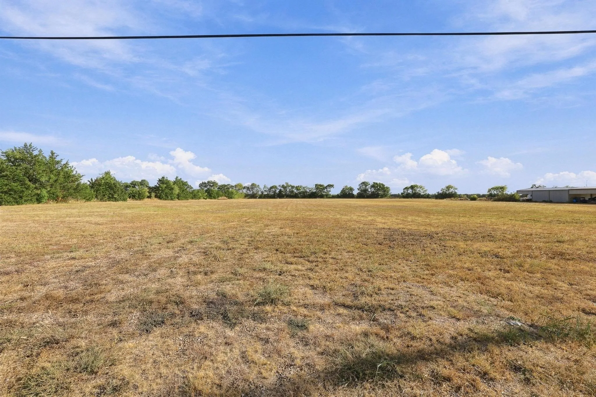 Expansive open land with a clear, open sky