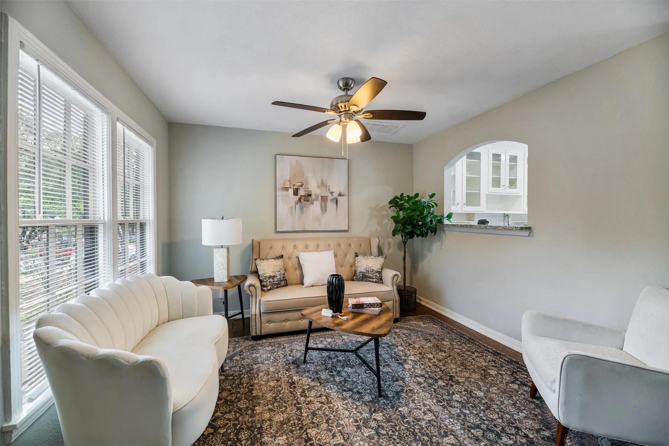 Living room with a pass through opening into the kitchen