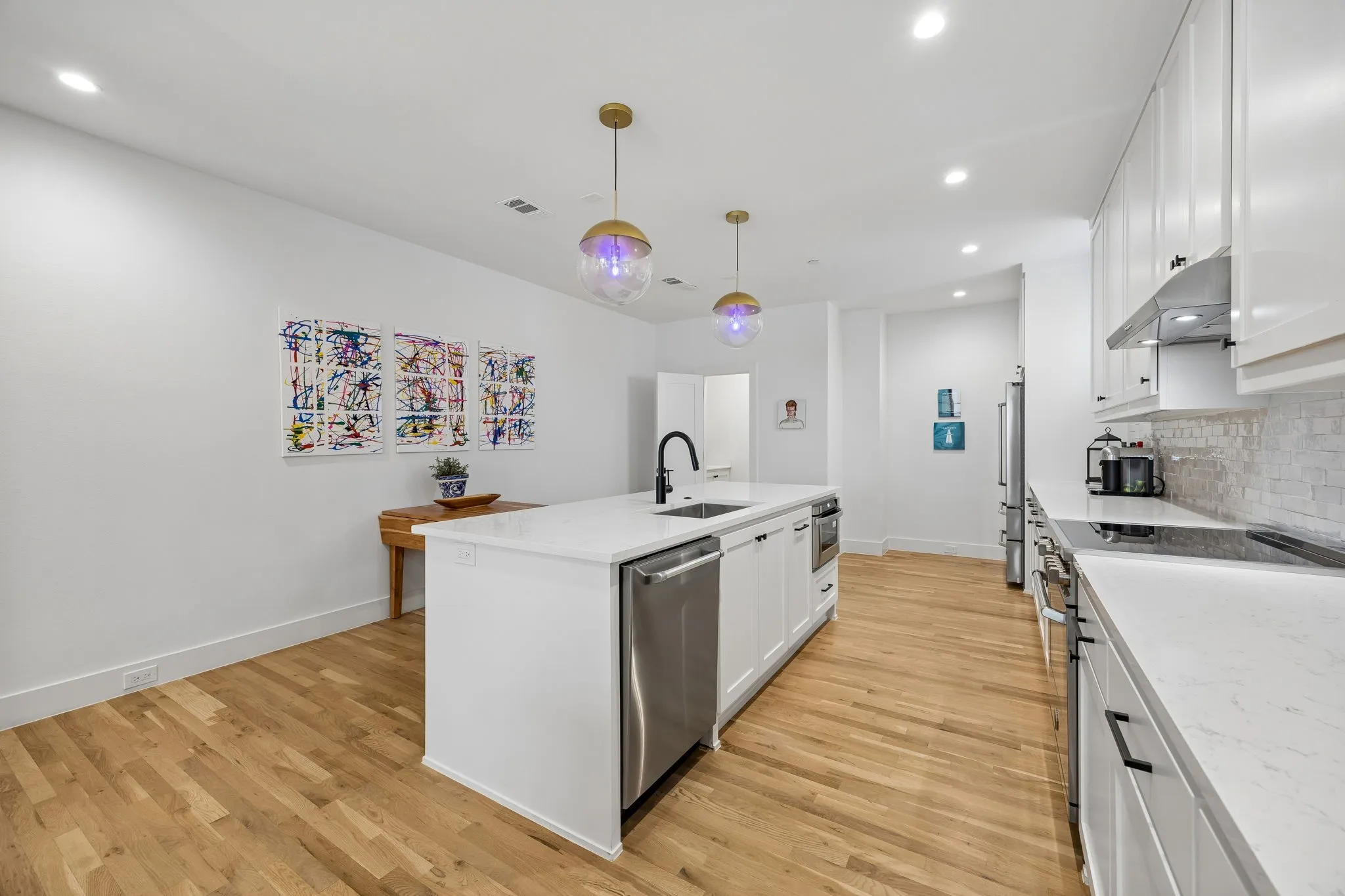 Chef inspired kitchen featuring high end Bertazzoni appliances, stainless steel finishes.