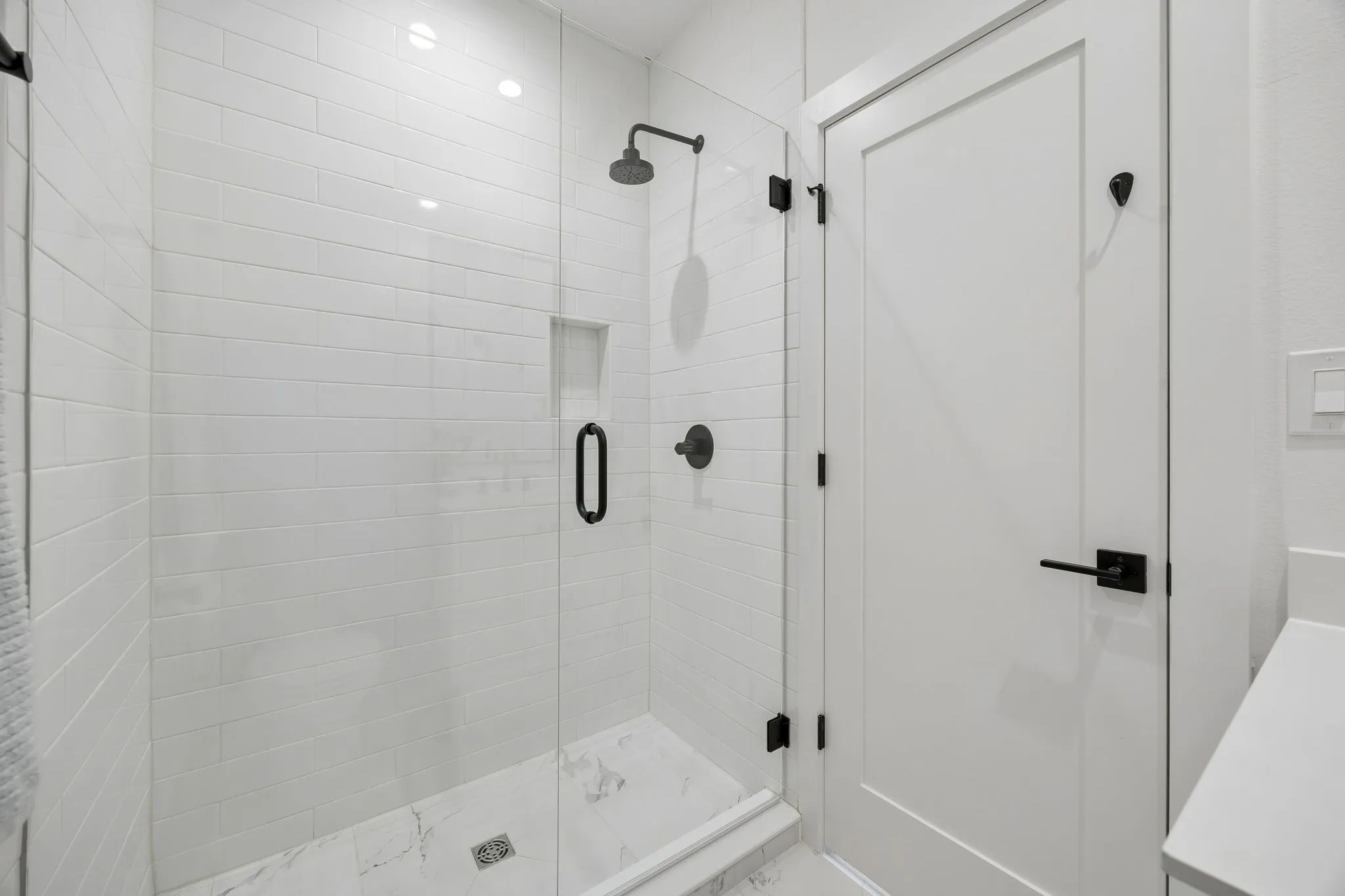 Bathroom with premier finishes and shower stall
