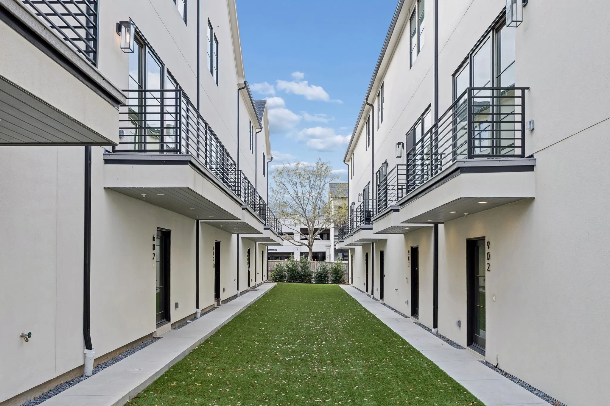 Overlooks the landscaped community turf courtyard with views of the thoughtfully designed shared green space