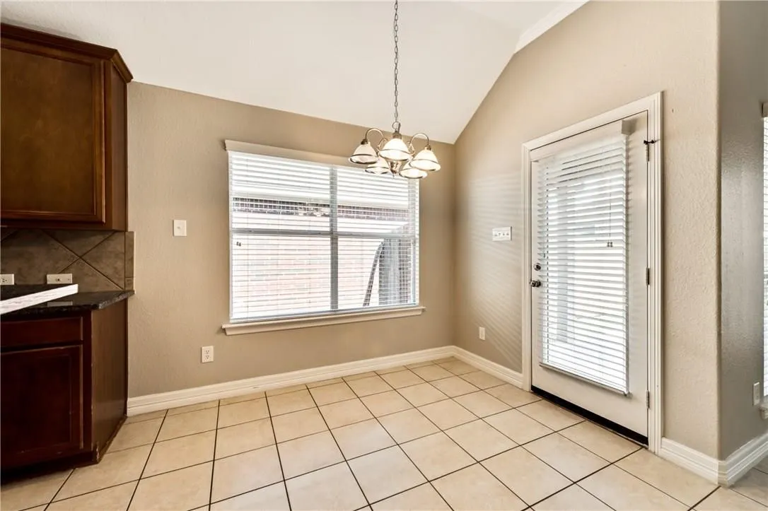 Angled vaulted ceiling with crown molding
