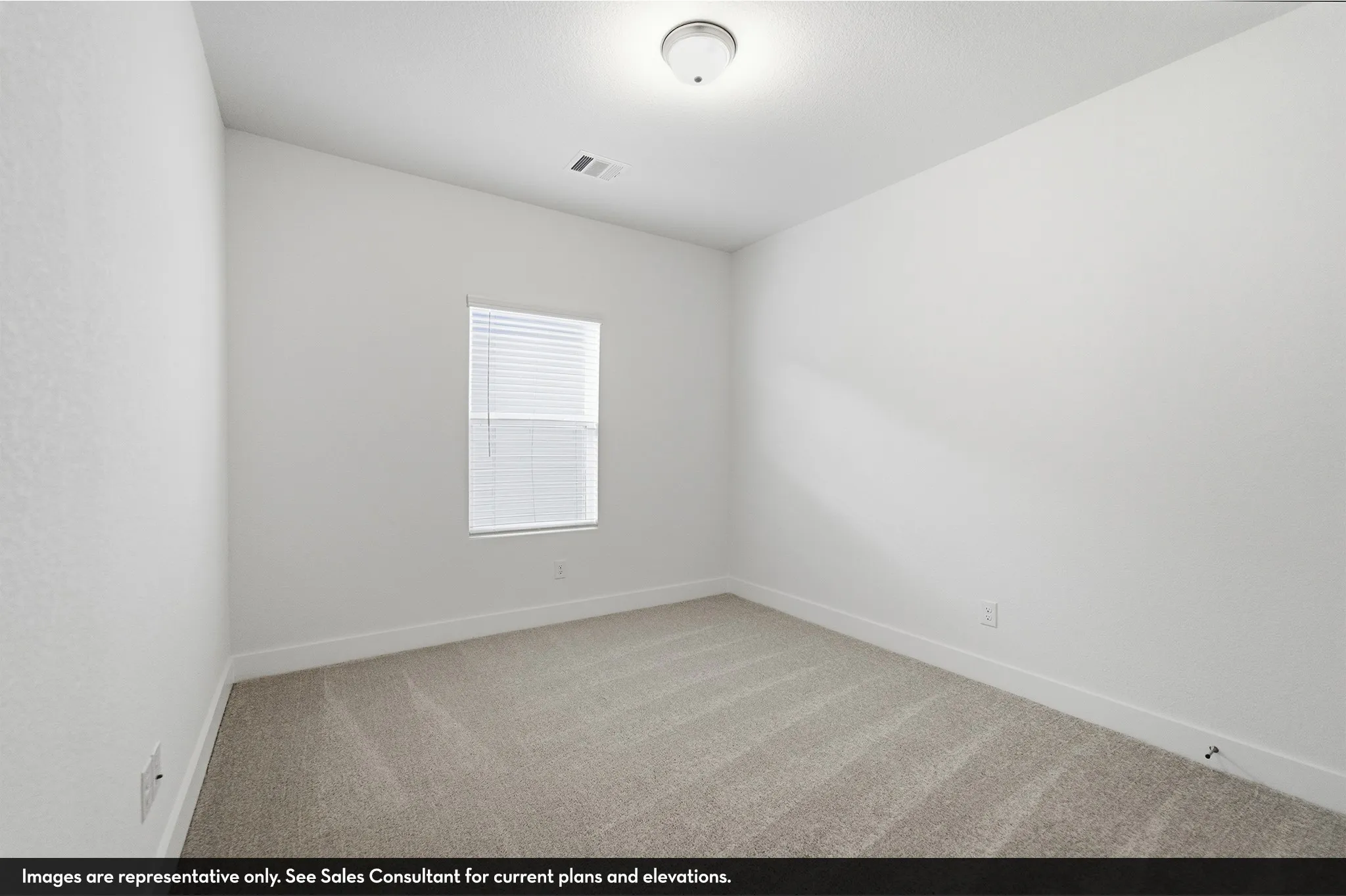 Neutral-toned carpeting, single window with blinds, overhead flush mount lighting, and white wall finishes