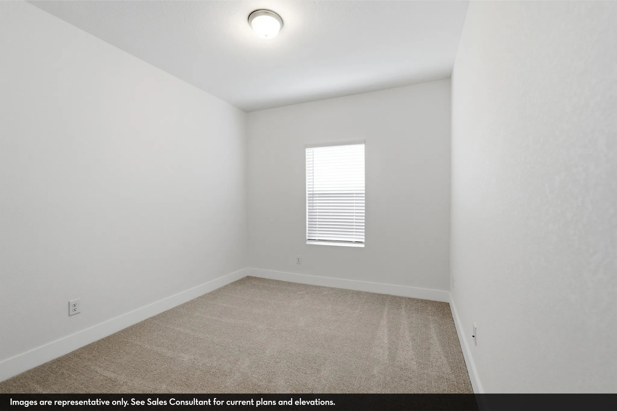 Neutral white walls with textured finish, overhead flush-mount lighting, and light-toned carpeting