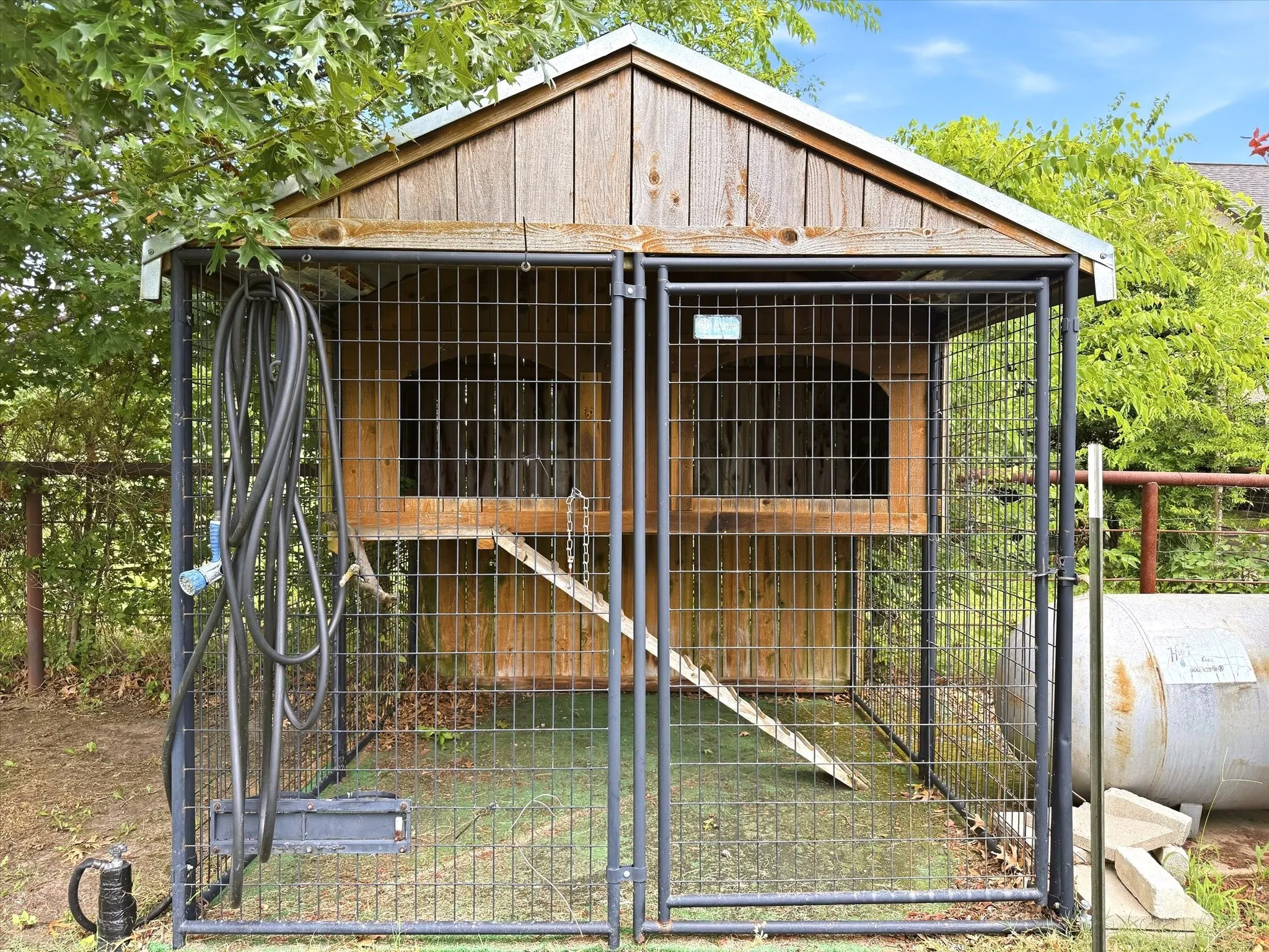 Fully enclosed and portable chicken coop.