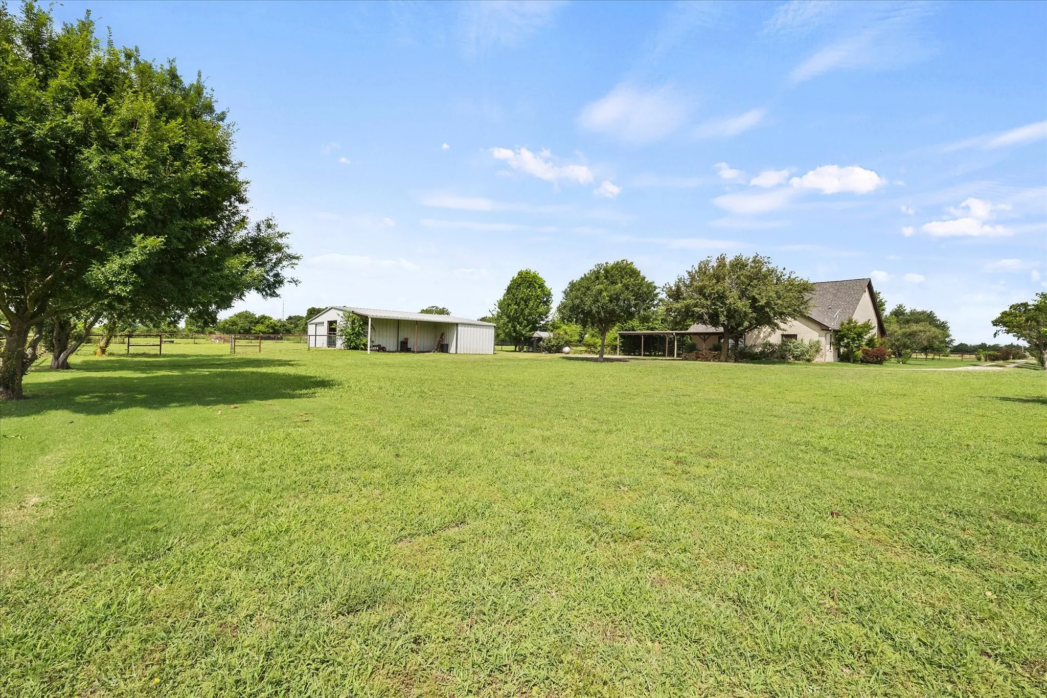 Back yard, barn and back of home.