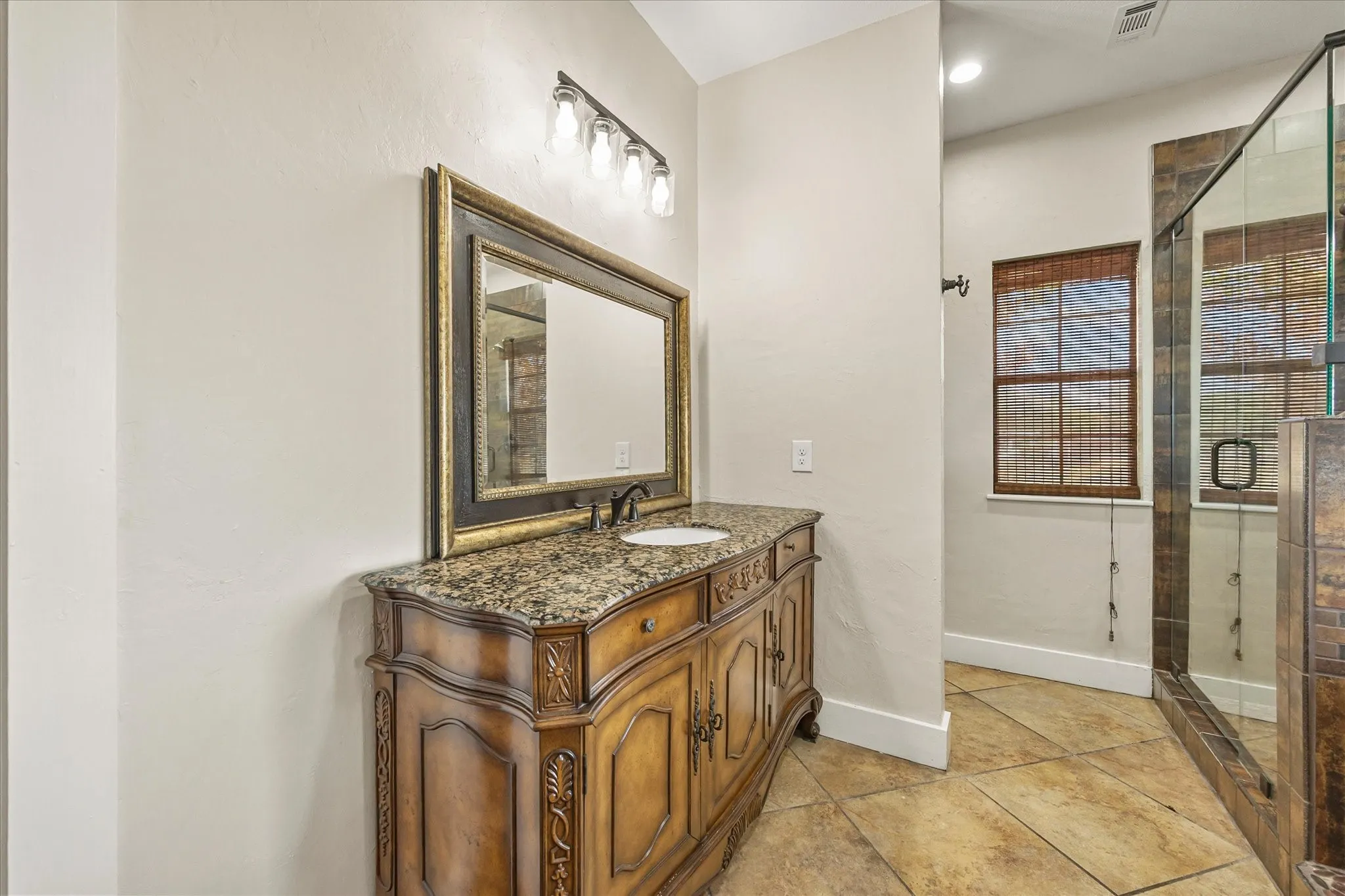Lots of counter and storage space and privacy wall to water closet.