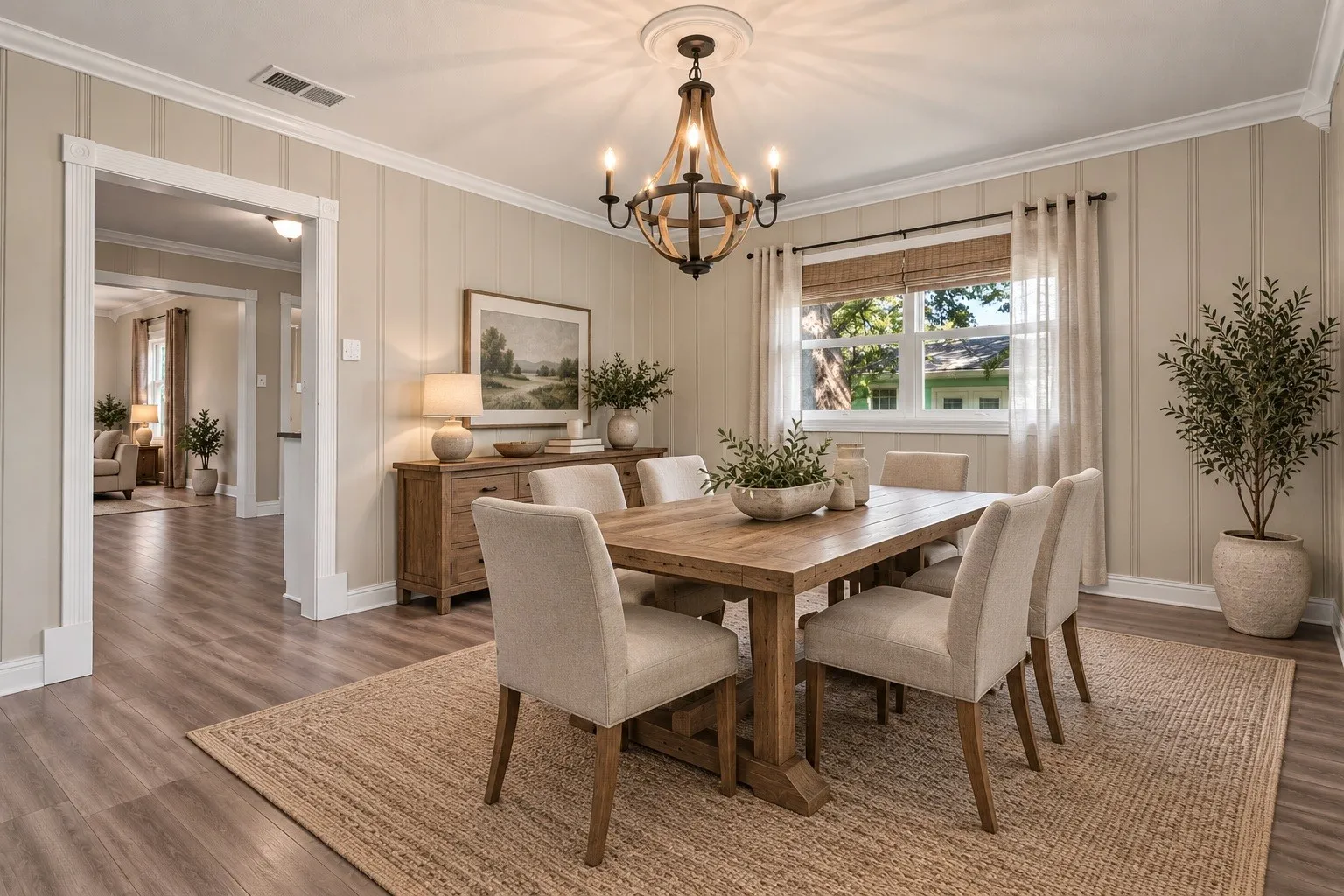 Virtually staged dining room with a clean, elegant design that highlights the space’s inviting atmosphere and natural flow.