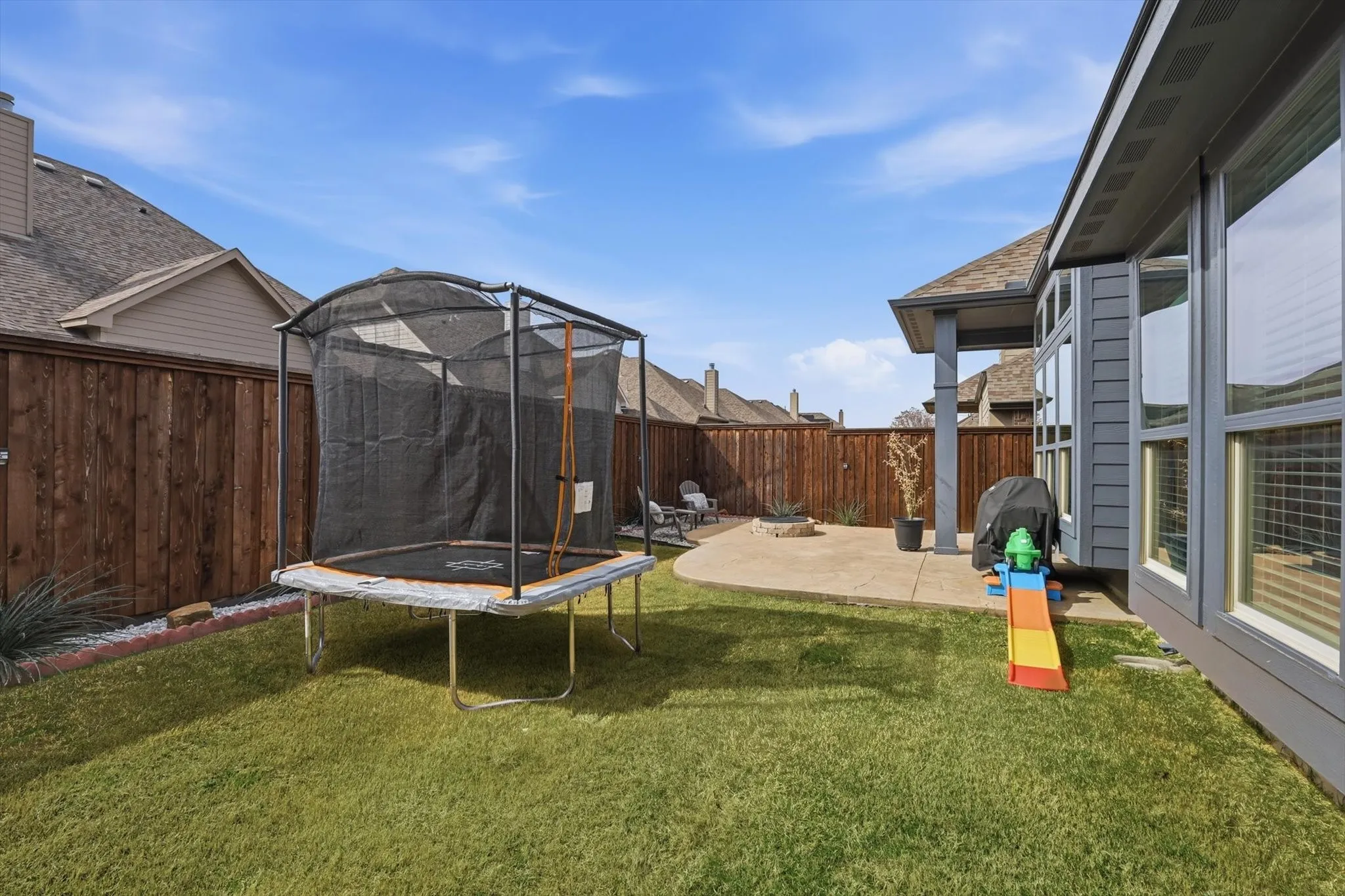 And a full view of the fenced, private backyard