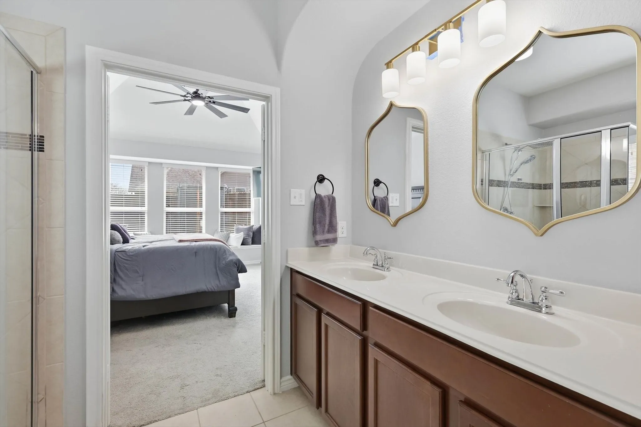 And from bath to primary bed with full view of the large windows.
